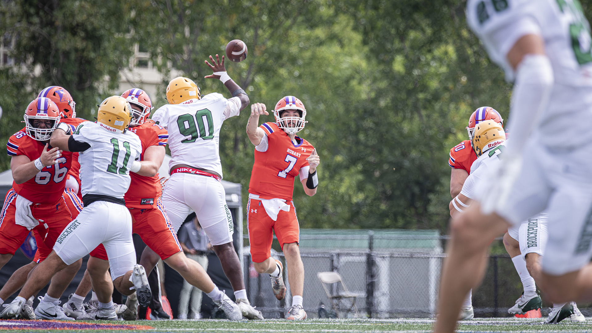 Aidan Conrath throws a pass. He threw for 142 yards and a TD against Brockport.