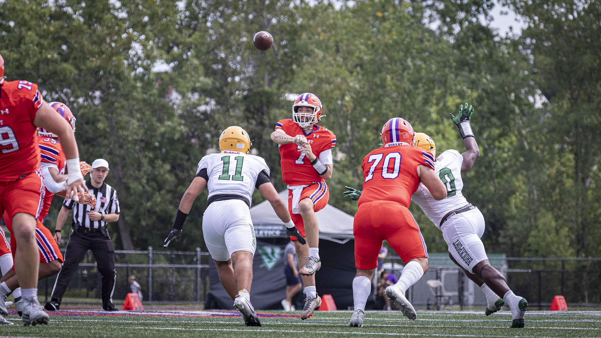 Aidan Conrath throws a pass. He threw for 142 yards and a TD against Brockport.