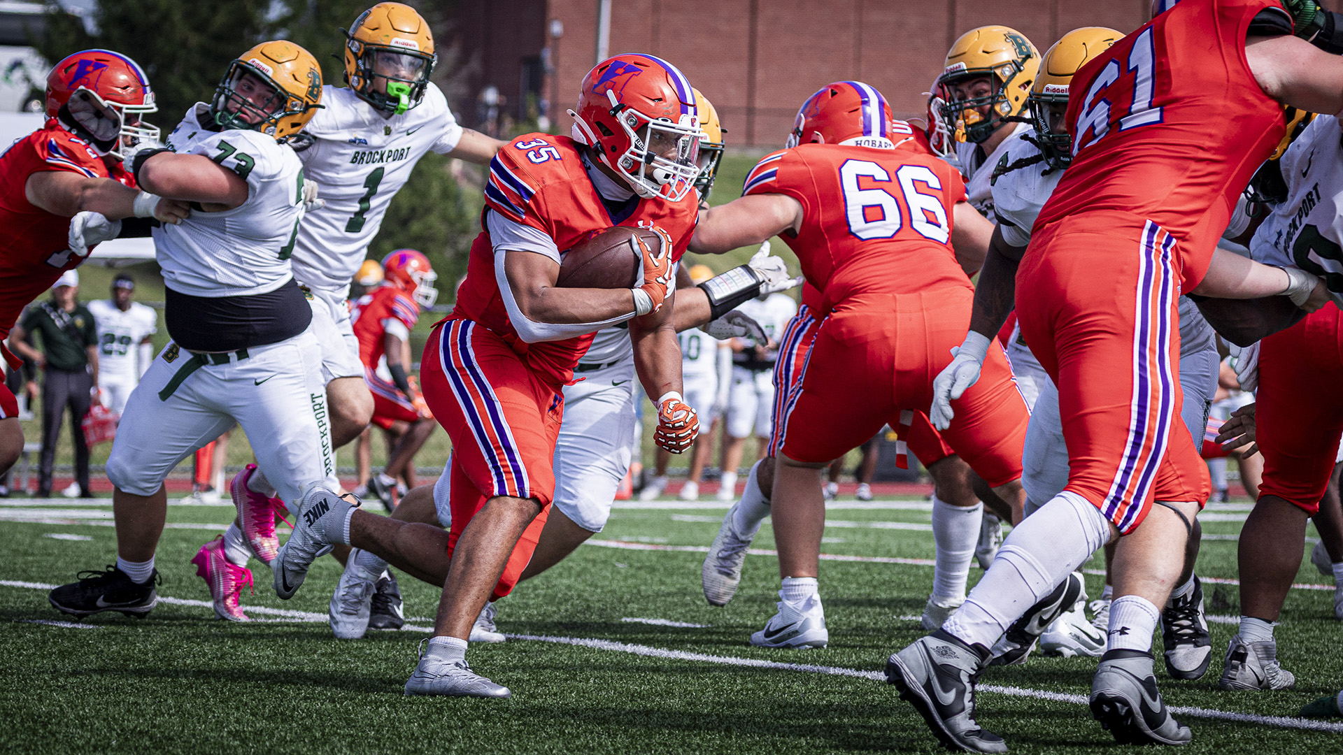 E. J. Taylor looks for room to run against Brockport.