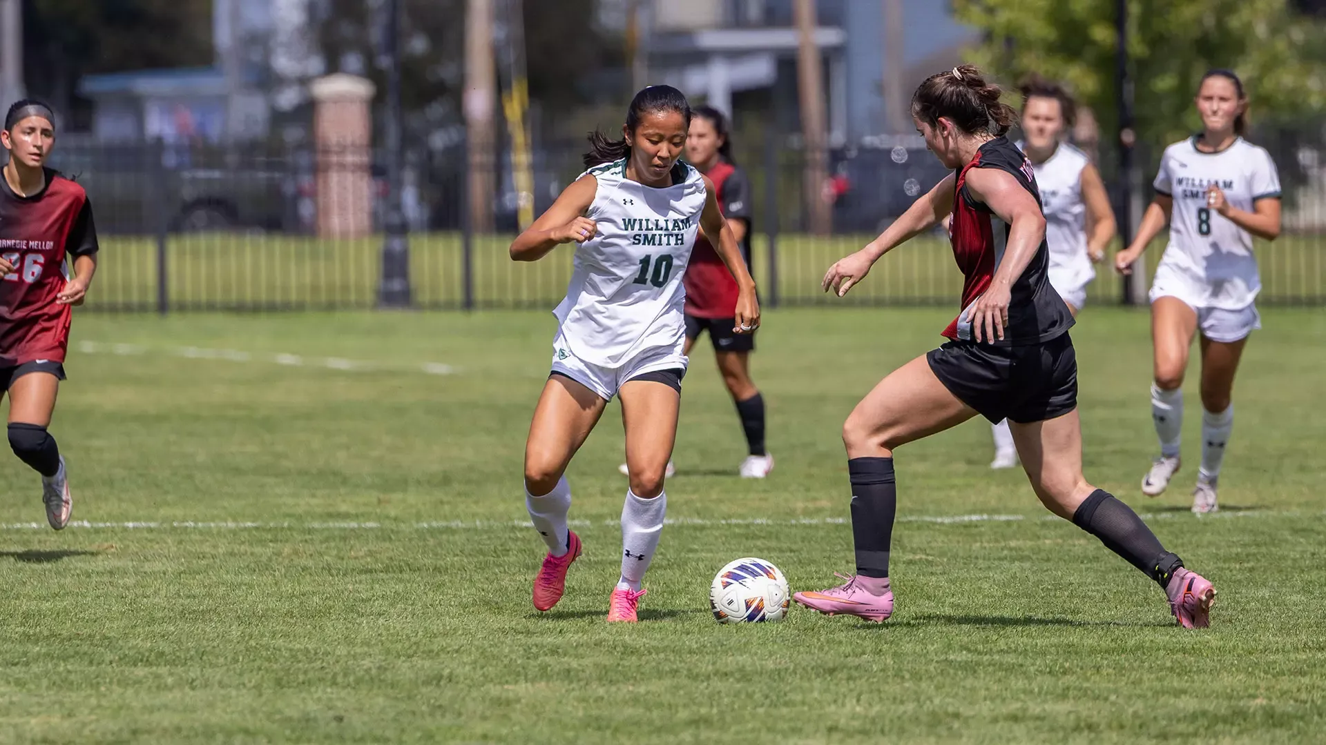 Rachel Lee approaches a defender with the ball