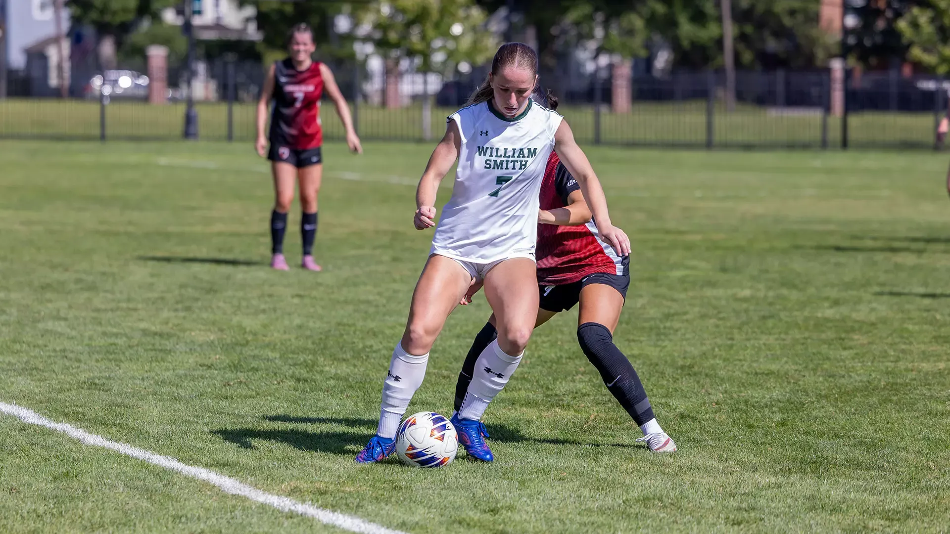 Kristin Middaugh handles the ball near the sideline