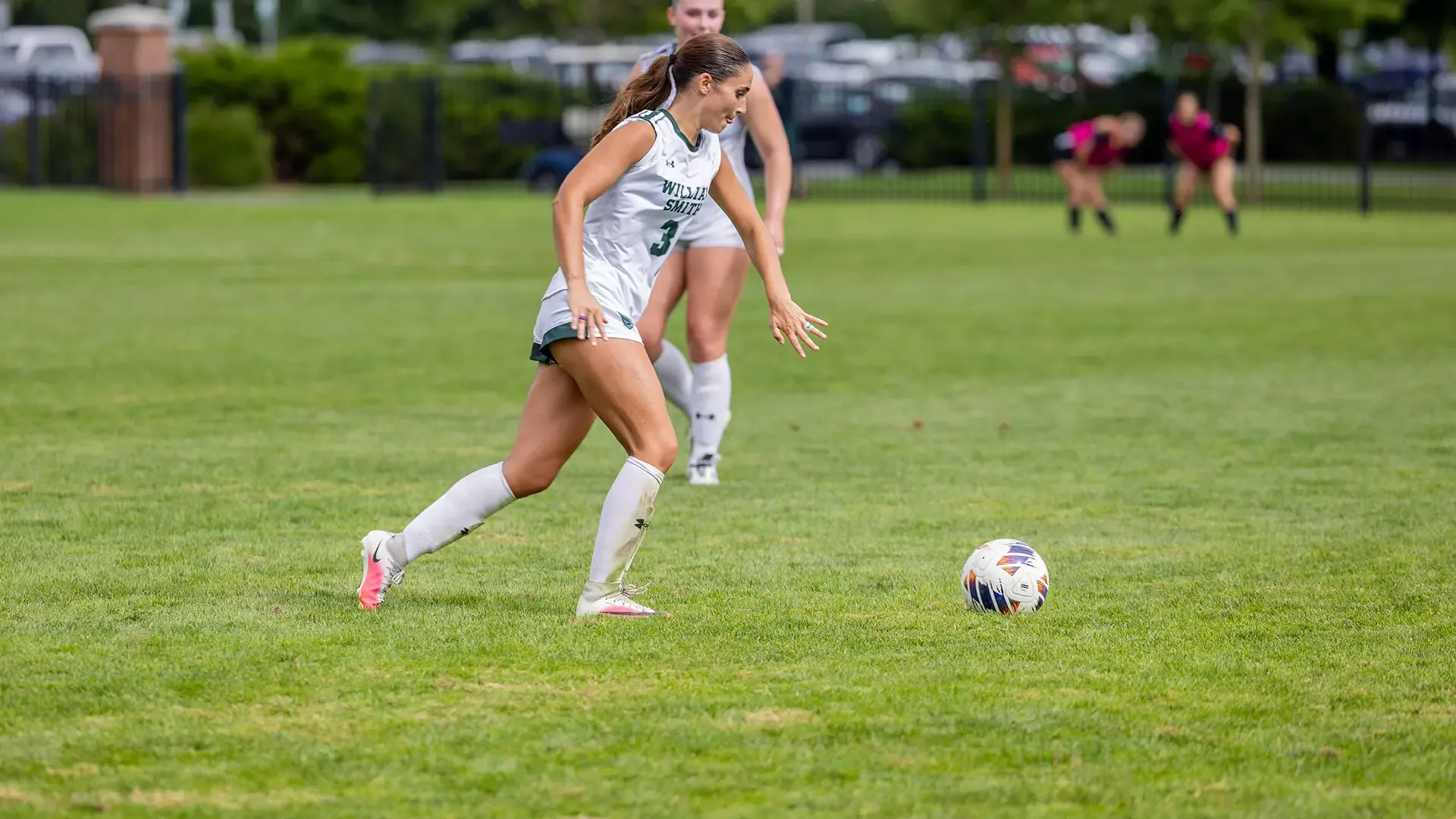 Sofia Carney running up to the ball