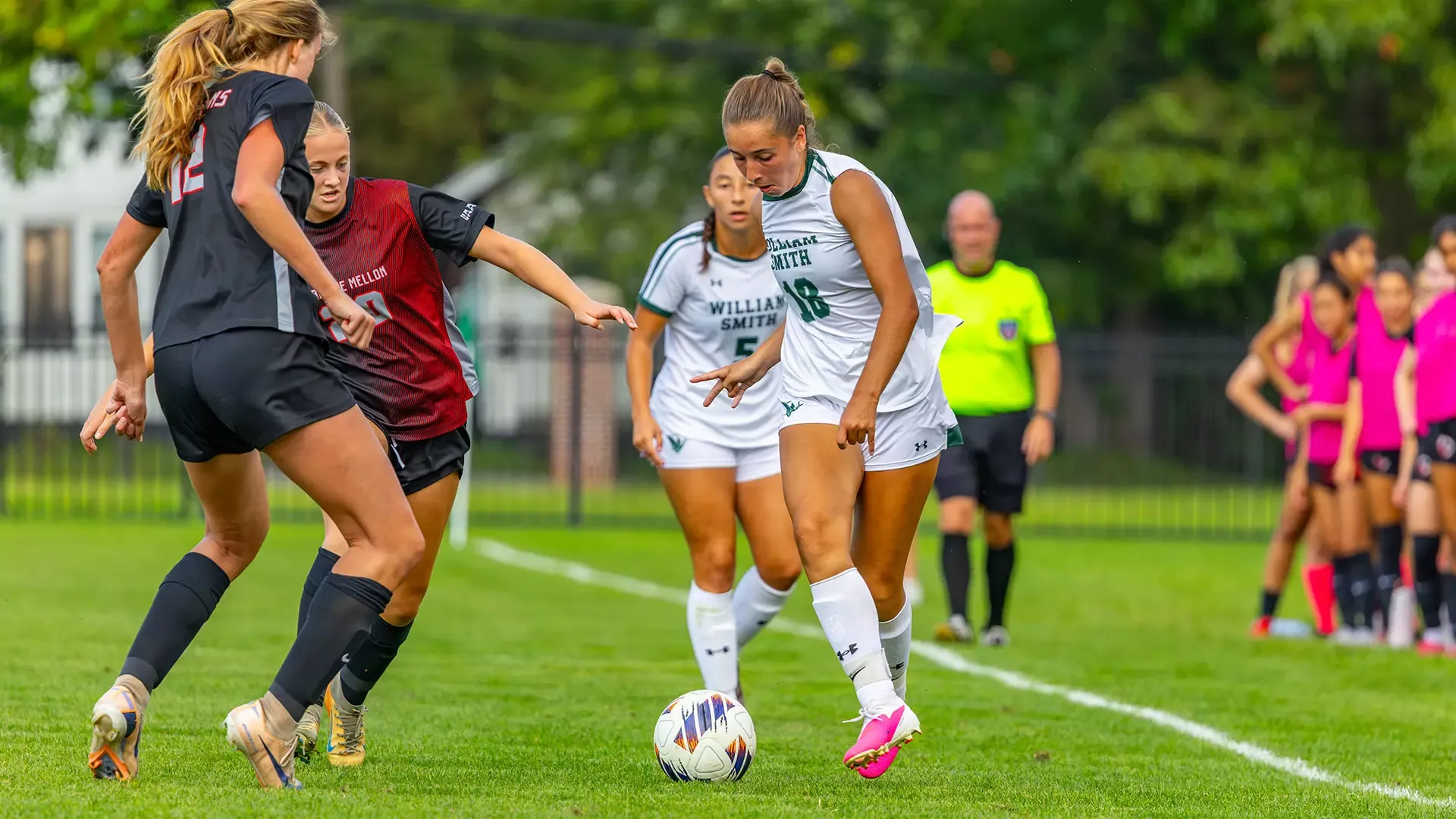 Grace Sudbay keeps ball away from defender
