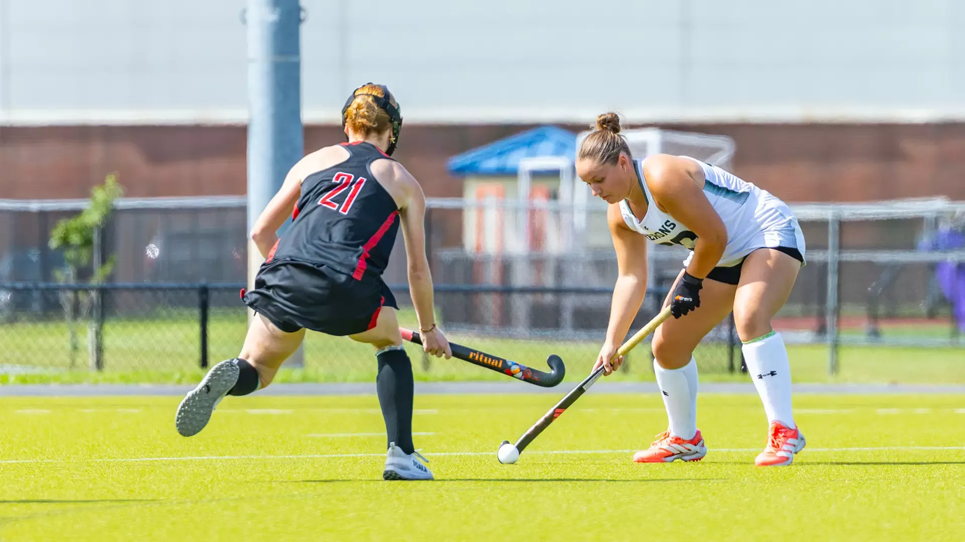Caroline Kogut gathers the ball to make a play around the defense