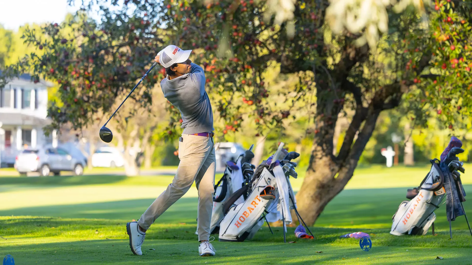 Aman Dhiman drives the ball