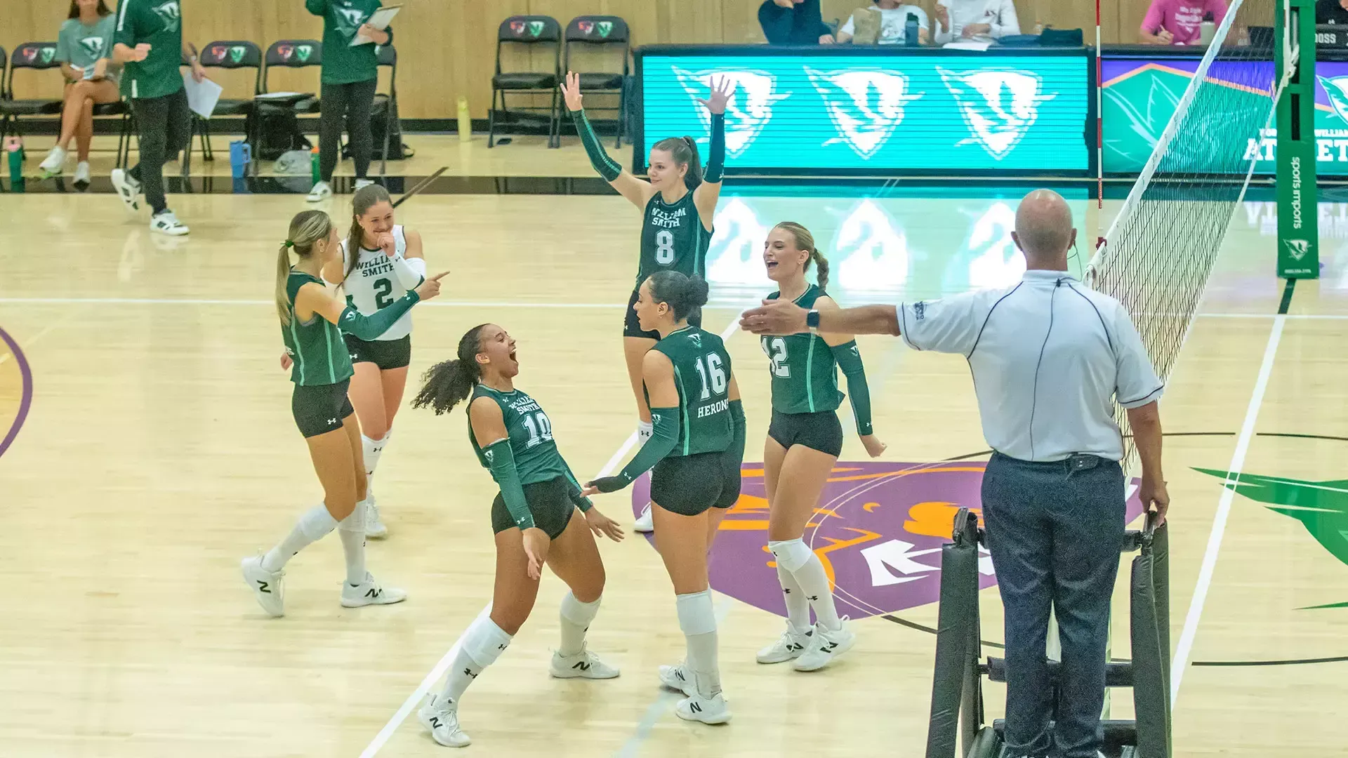 William Smith volleyball celebrates after a point