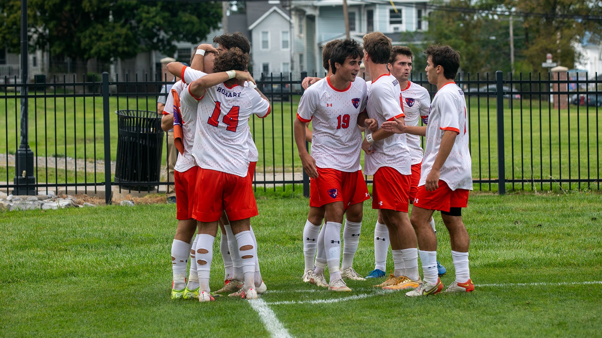 The Statesmen celebrate the game-winning goal against Bard.
