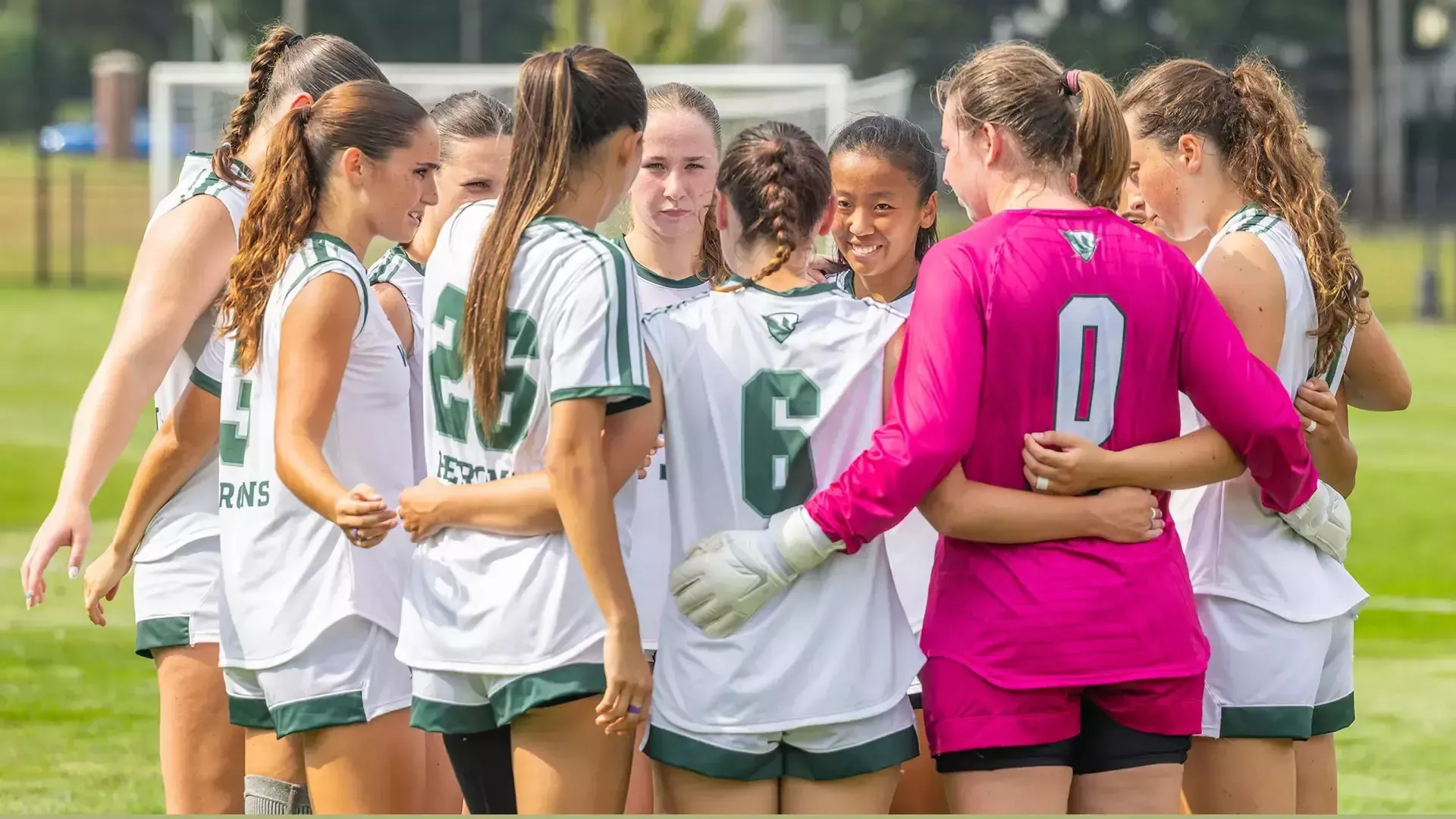 William Smith Soccer starting line up gathers together prior to kickoff 