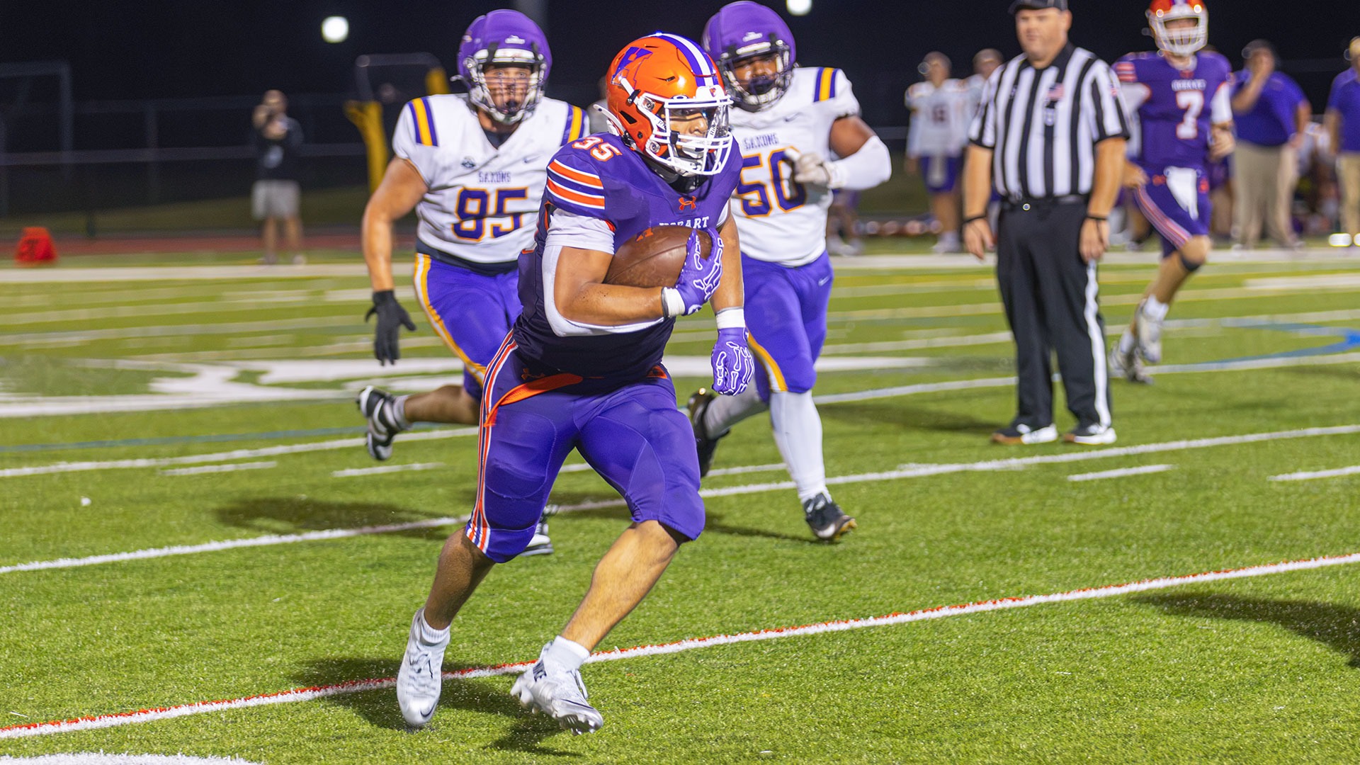 E.J. Taylor rushes for a big gain against Alfred.
