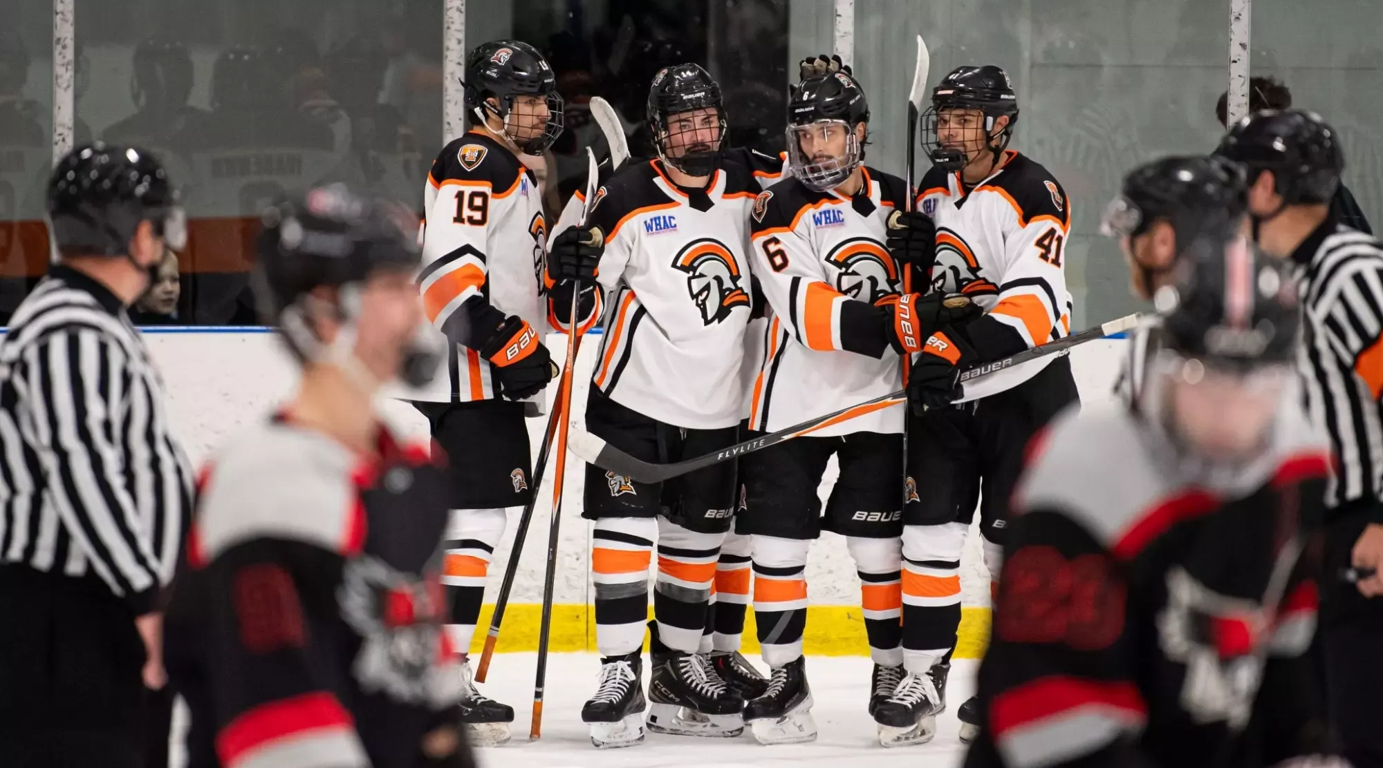 Team regroups after whistle  