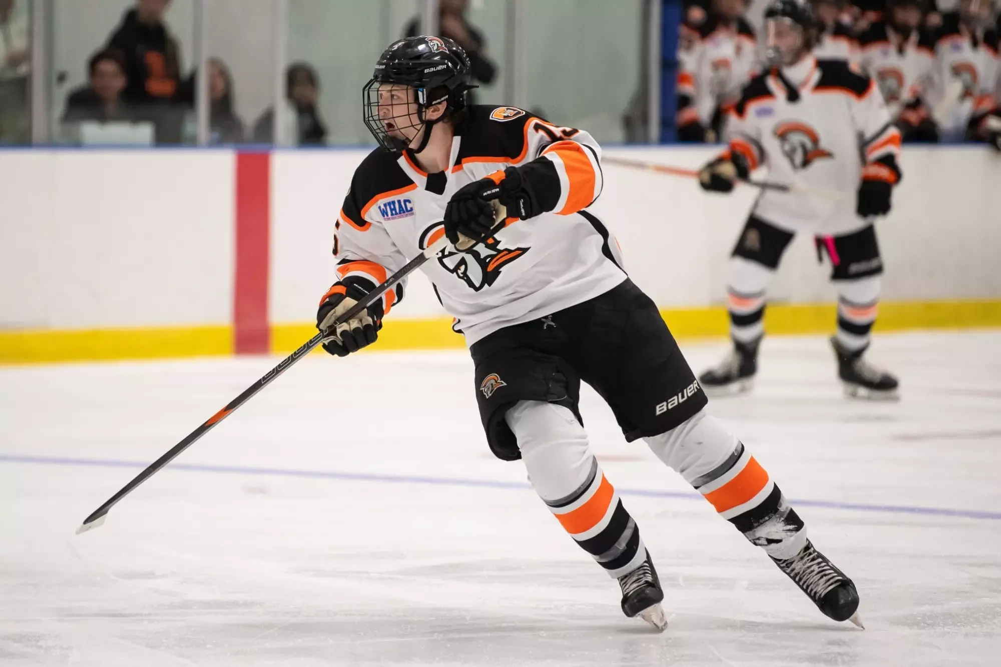 Ethan Dominy skates up ice 