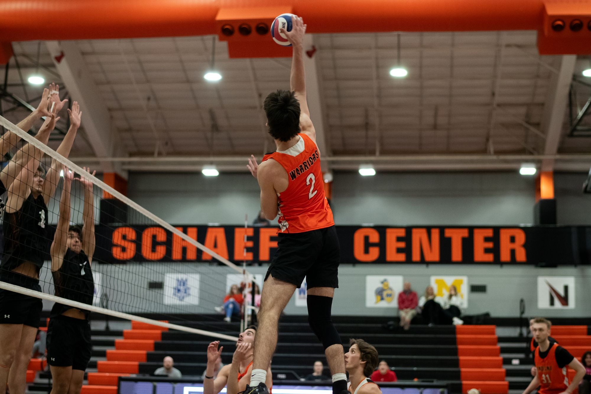 Dylan Poore attack at the net 