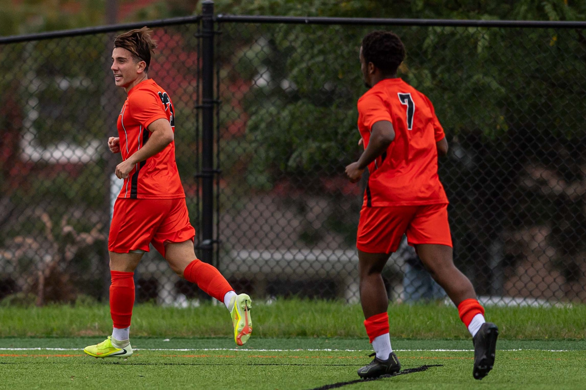 Emre Baris and Matthew Takawira celebrate a goal