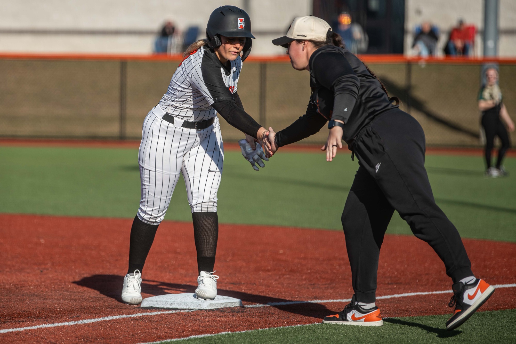 Walter and Coach Mata at first base 
