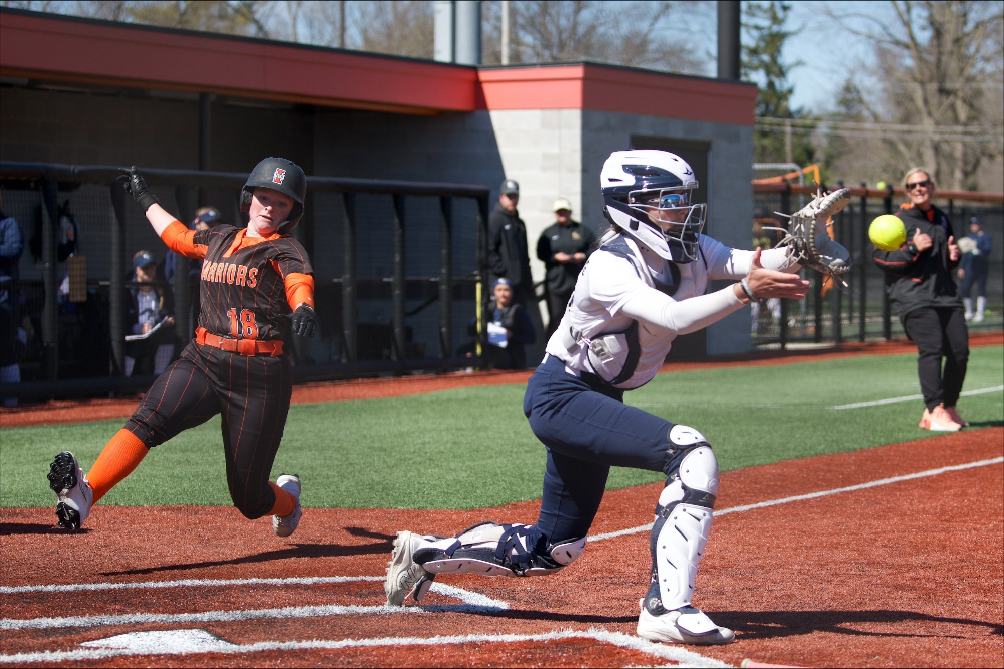 Delaney sliding into home to score 