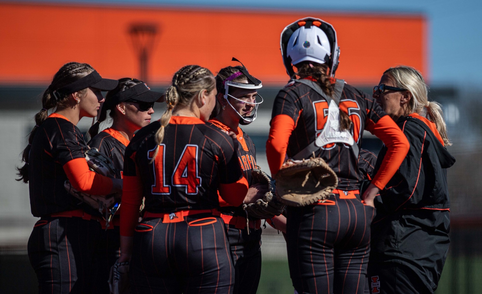 Coach Zimny has field meeting with the team 