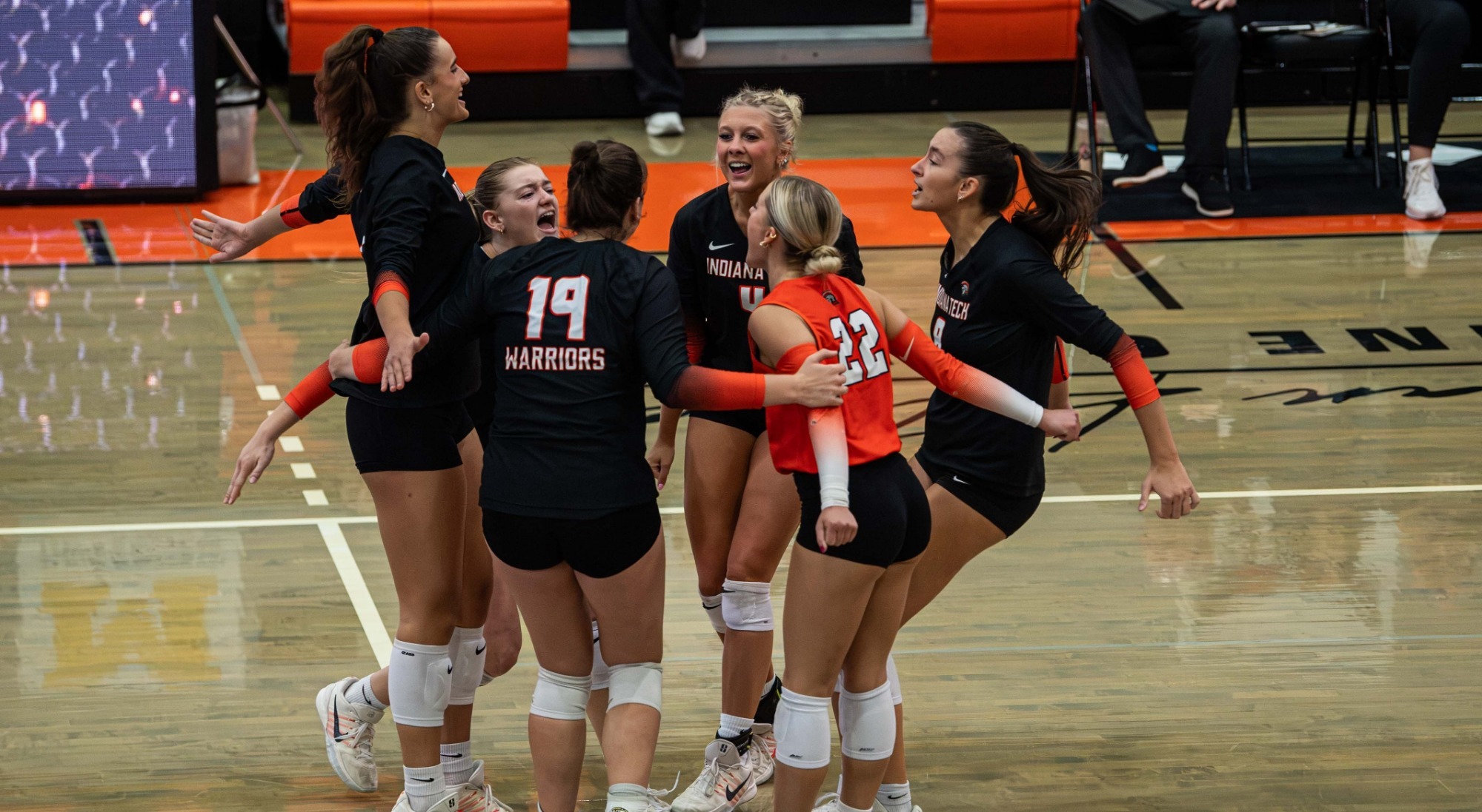 womens volleyball team celebration 