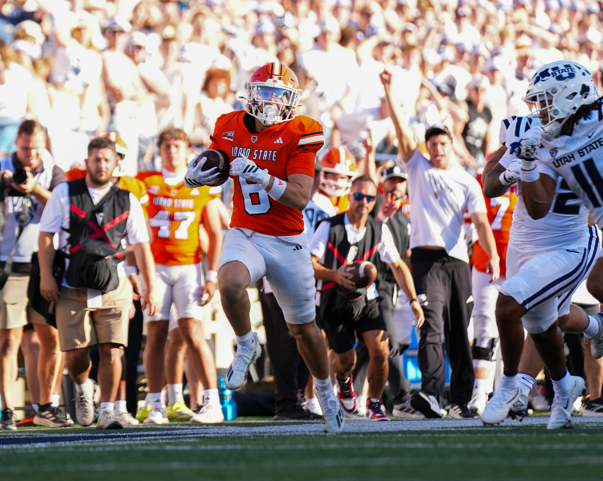 Carson Running at Utah State