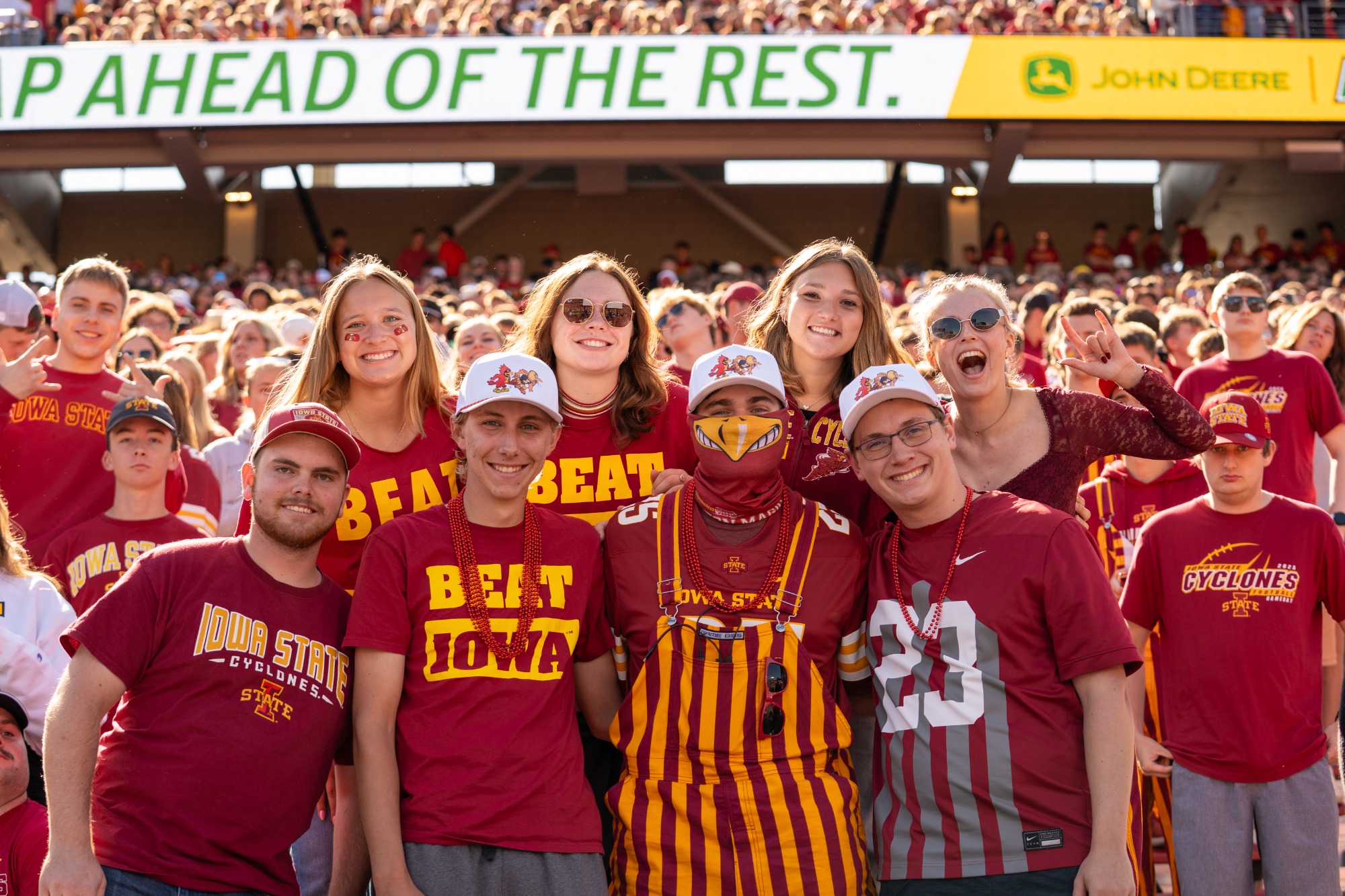 Iowa State students cheering in the Jack Trice Stadium student section