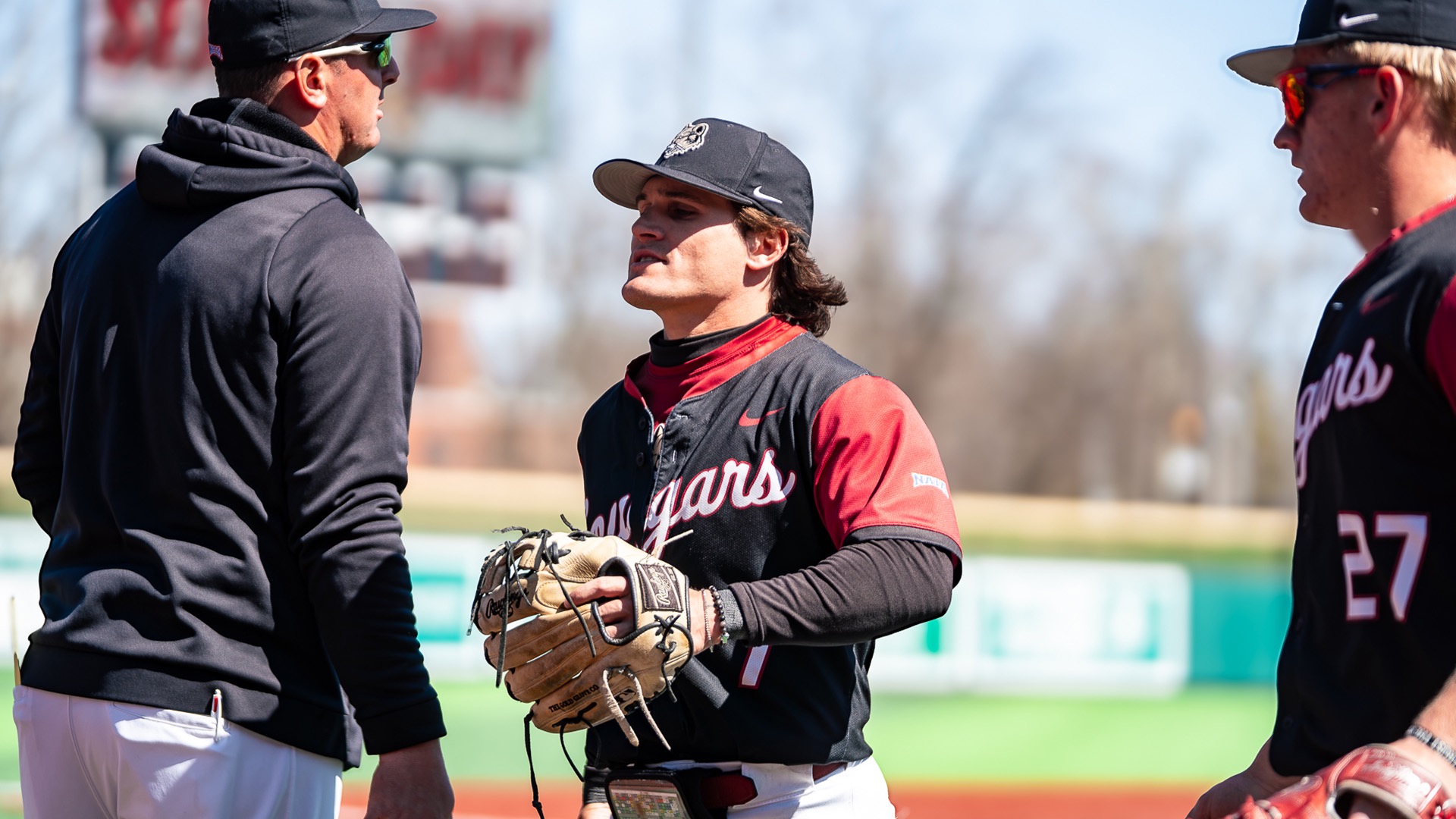 Wolf Heading to Dugout/Coach Conner Background