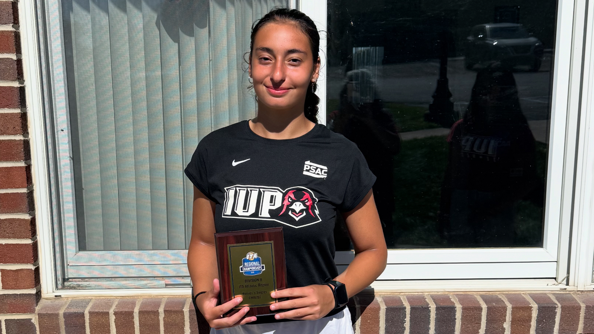 Asel Calbay Pose with trophy