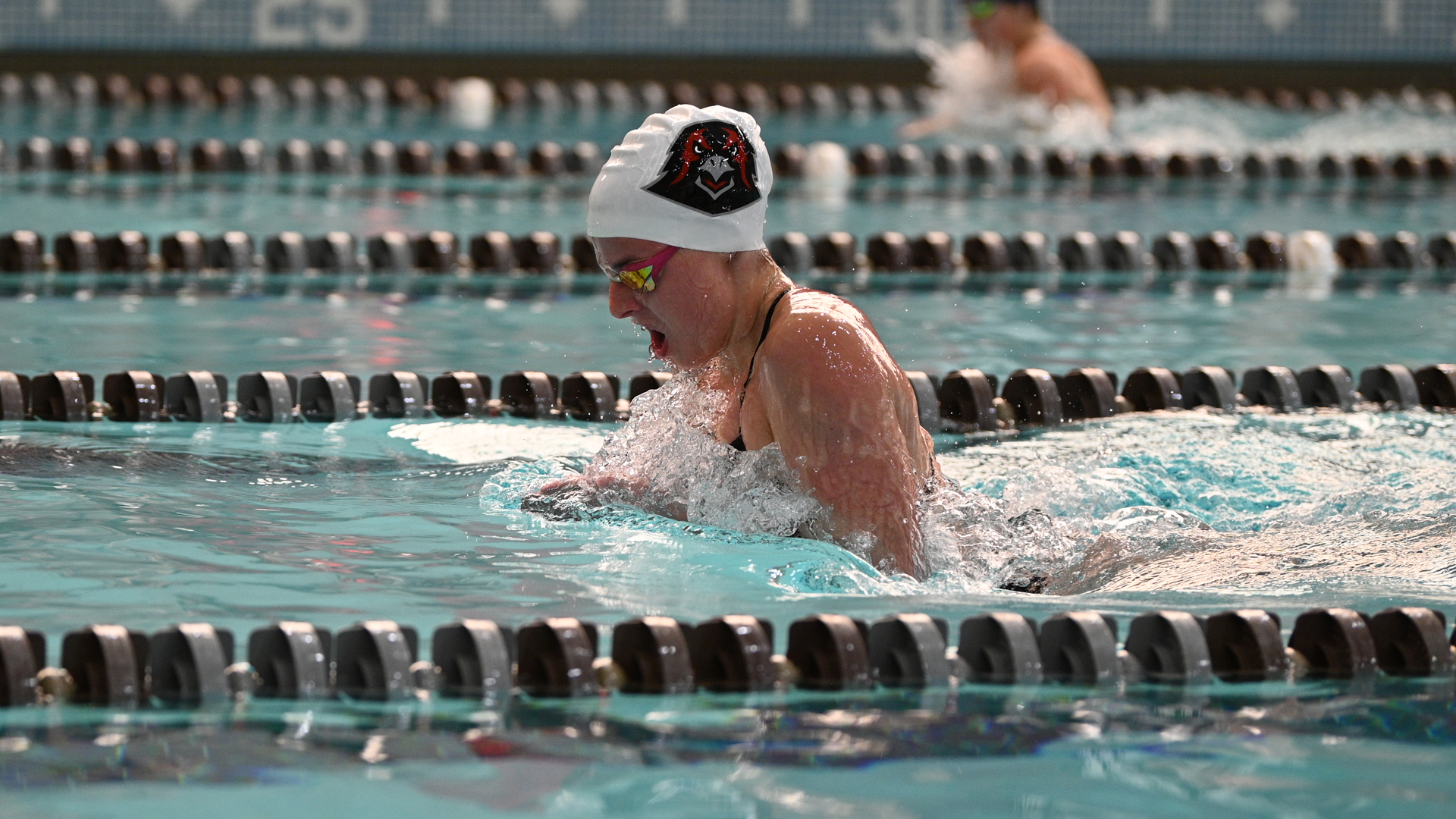 Woman Swimmer taking breath