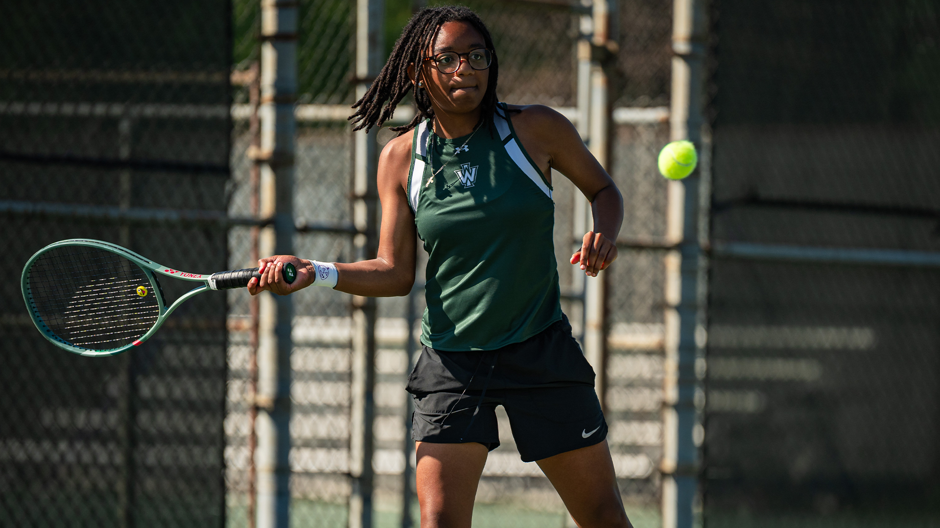Adia Douglas returning a shot against Carthage Oct. 4, 2025