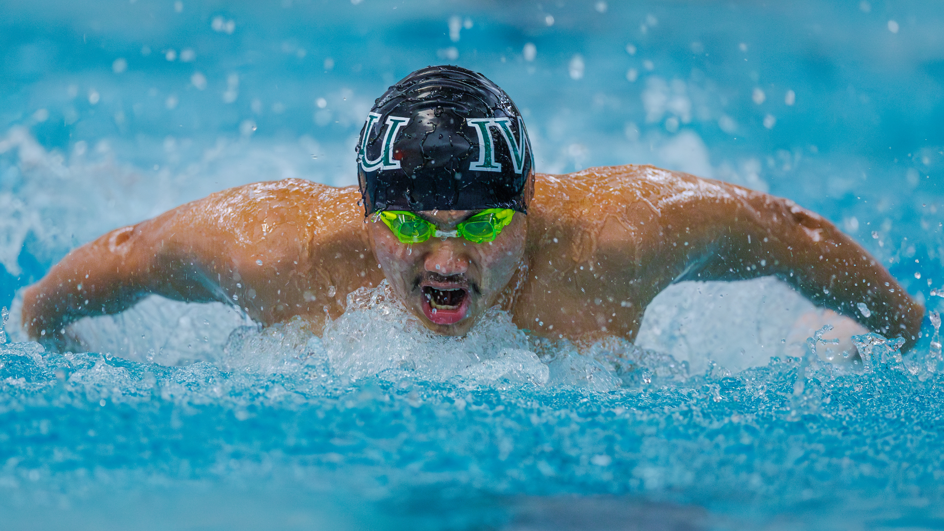 Jacob Nacional swimming in IWU Halloween Invite 2024