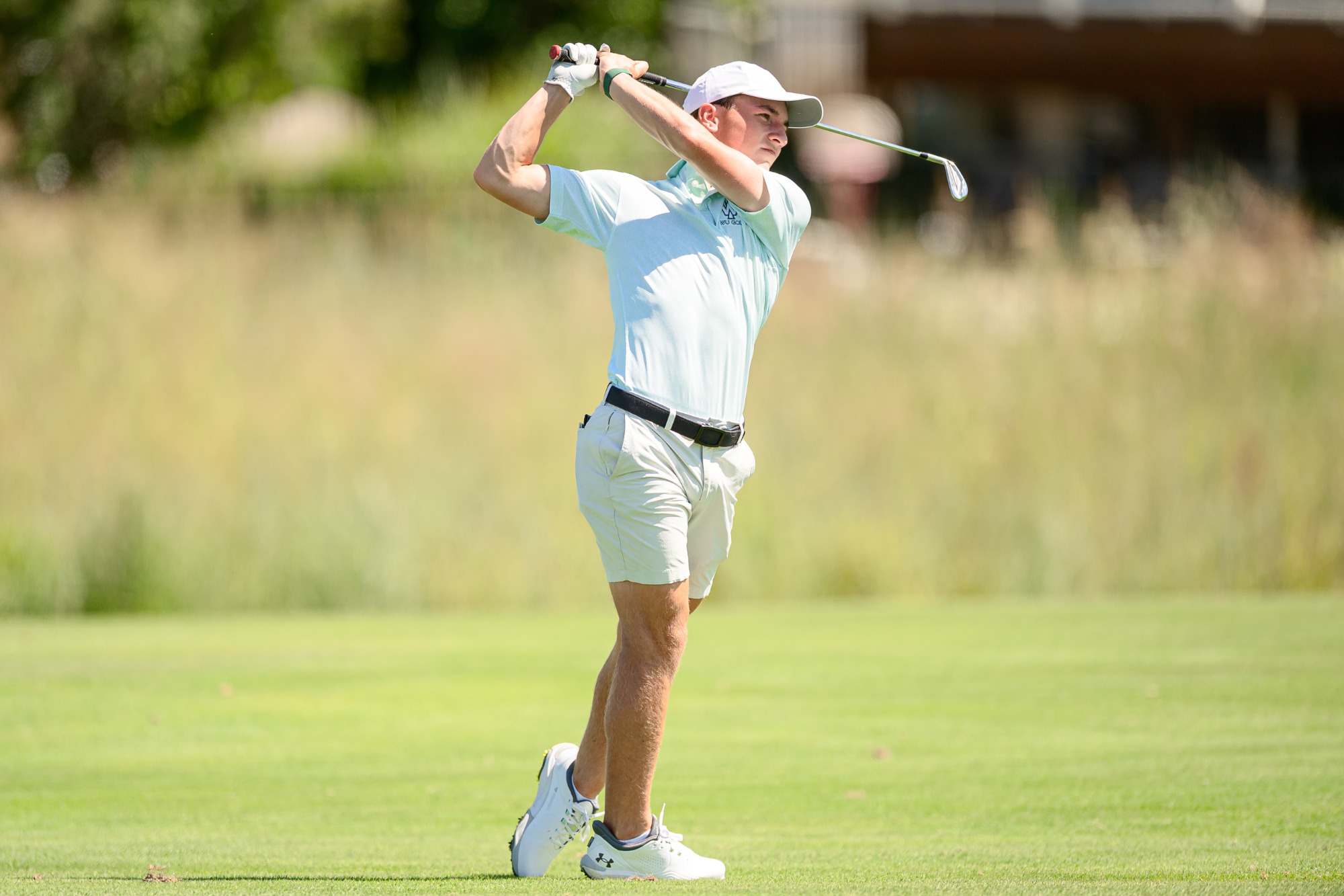 Ben Gelven hitting from fairway
