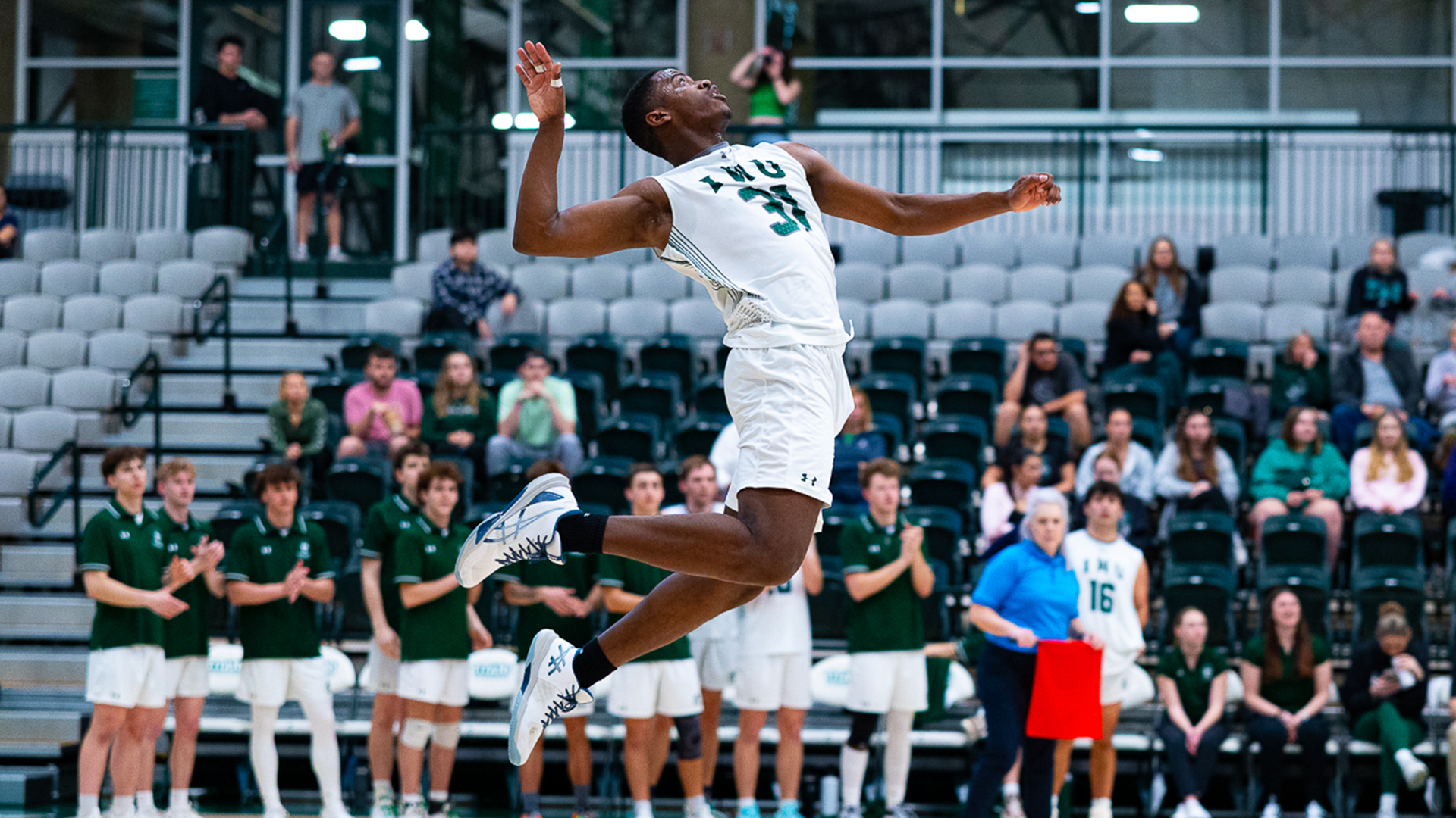 Bryce Williams serving against North Park March 19, 2025