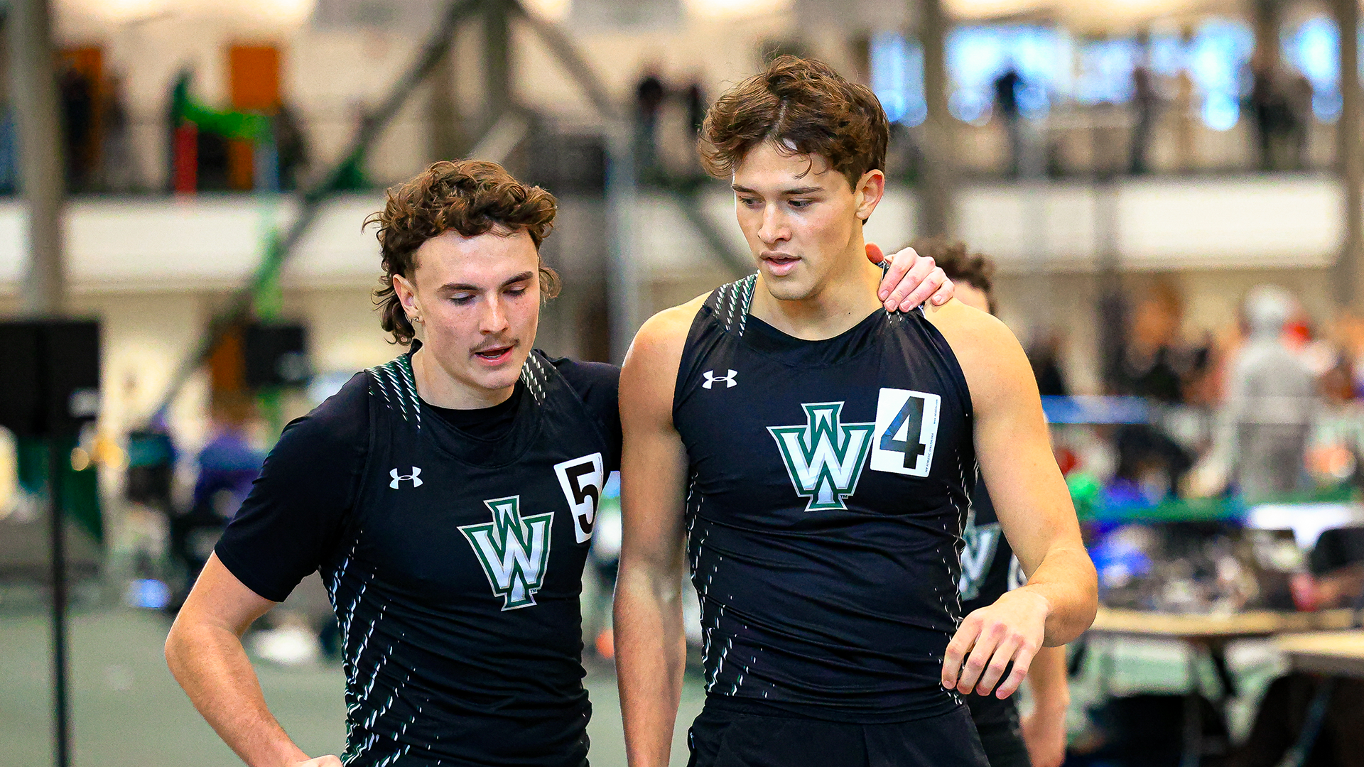 Luke Alberstett and Alex Maas post 4x400m relay Coach Shoe Invite 01-17-2026