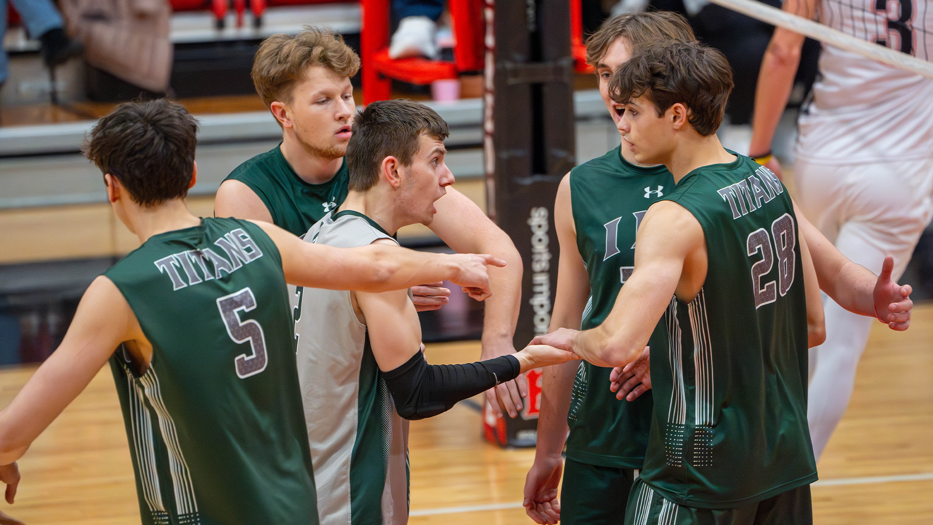 Men's volleyball celebrating a point at Benedictine Jan. 20, 2026