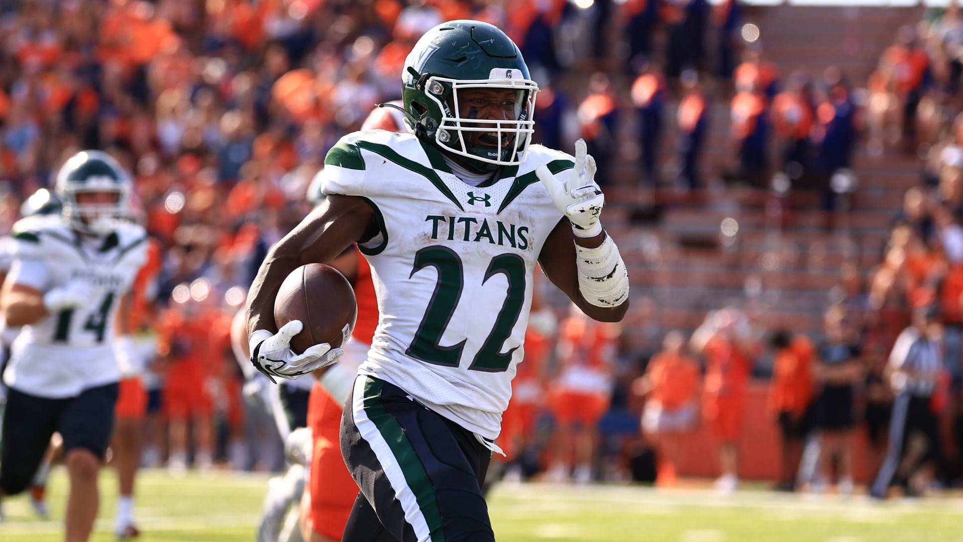 Malik Gray rushing for one of his four touchdowns