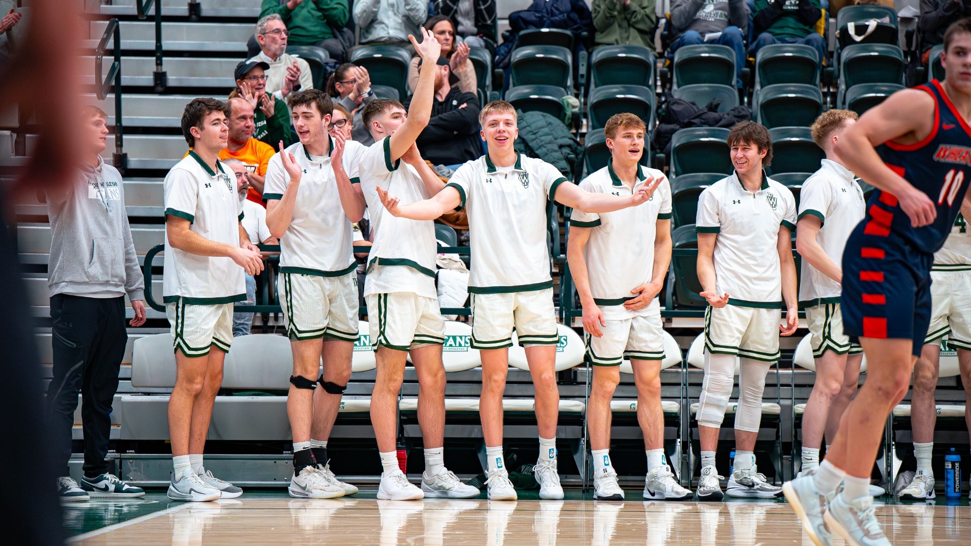 Men's basketball bench celebration