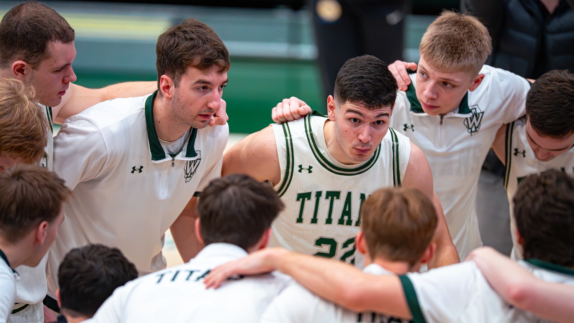 Men's basketball huddle