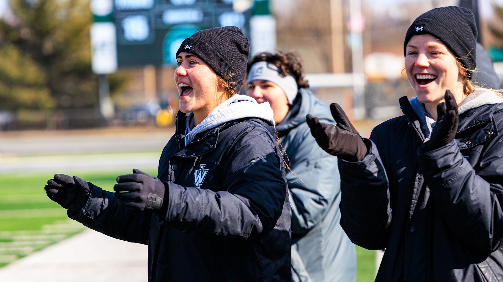 IWU Women's Lacrosse Coaches Abby Kushina and Monica Jarrett celebrating win over IIT Feb. 21, 2026