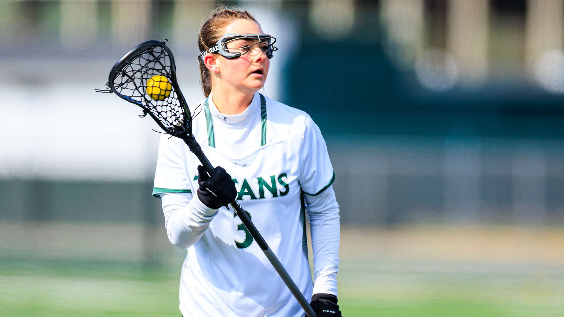 Maddie Gibson on offense cradling ball against Illinois Tech Feb. 21, 2026