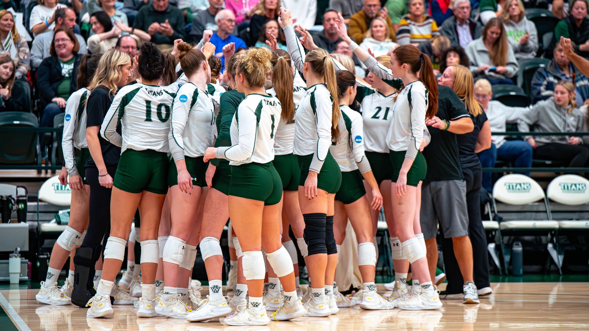 Titan huddle during 2025 NCAA Regional Championship