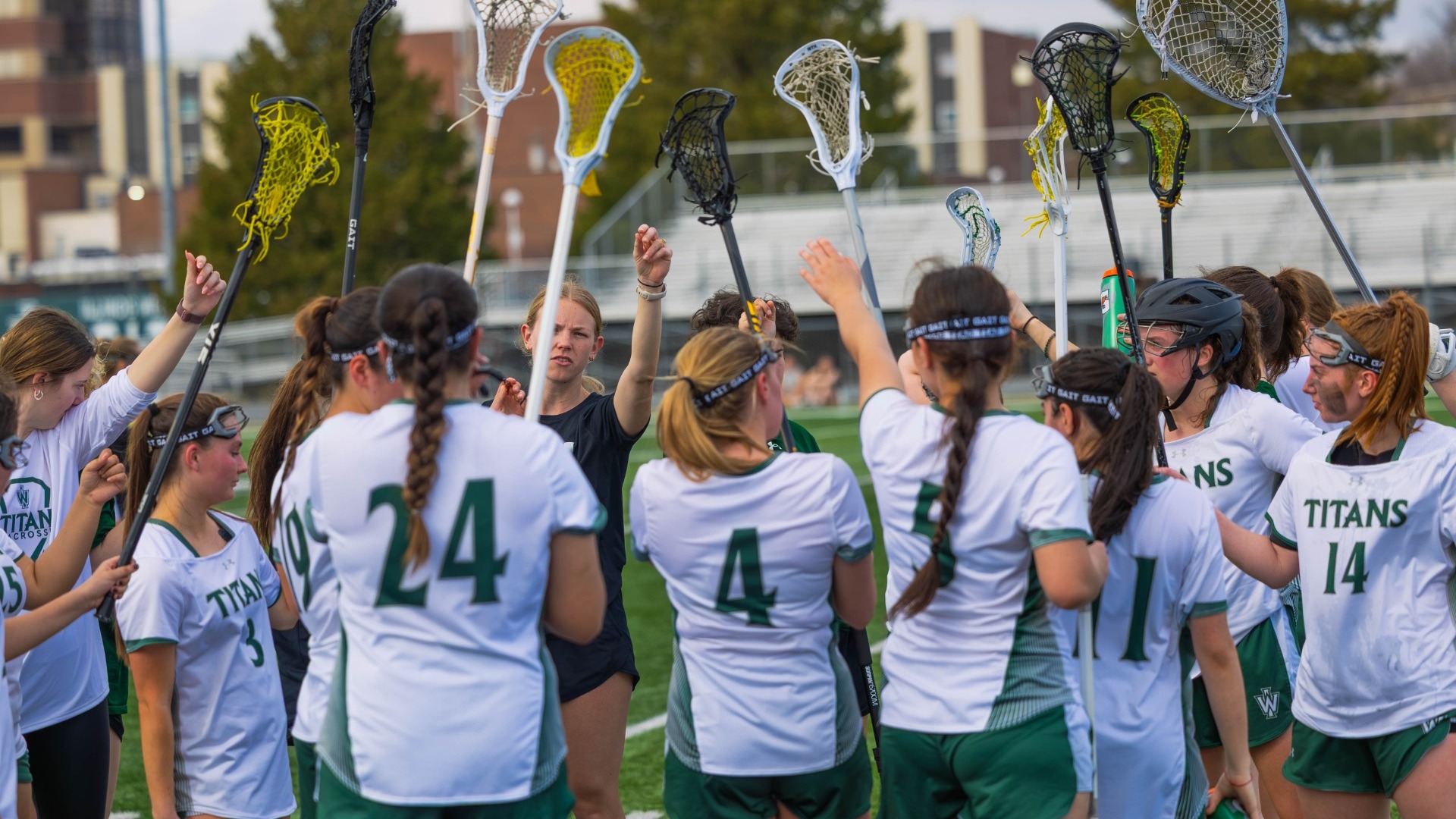 Titans in a huddle against DePauw March 10, 2026