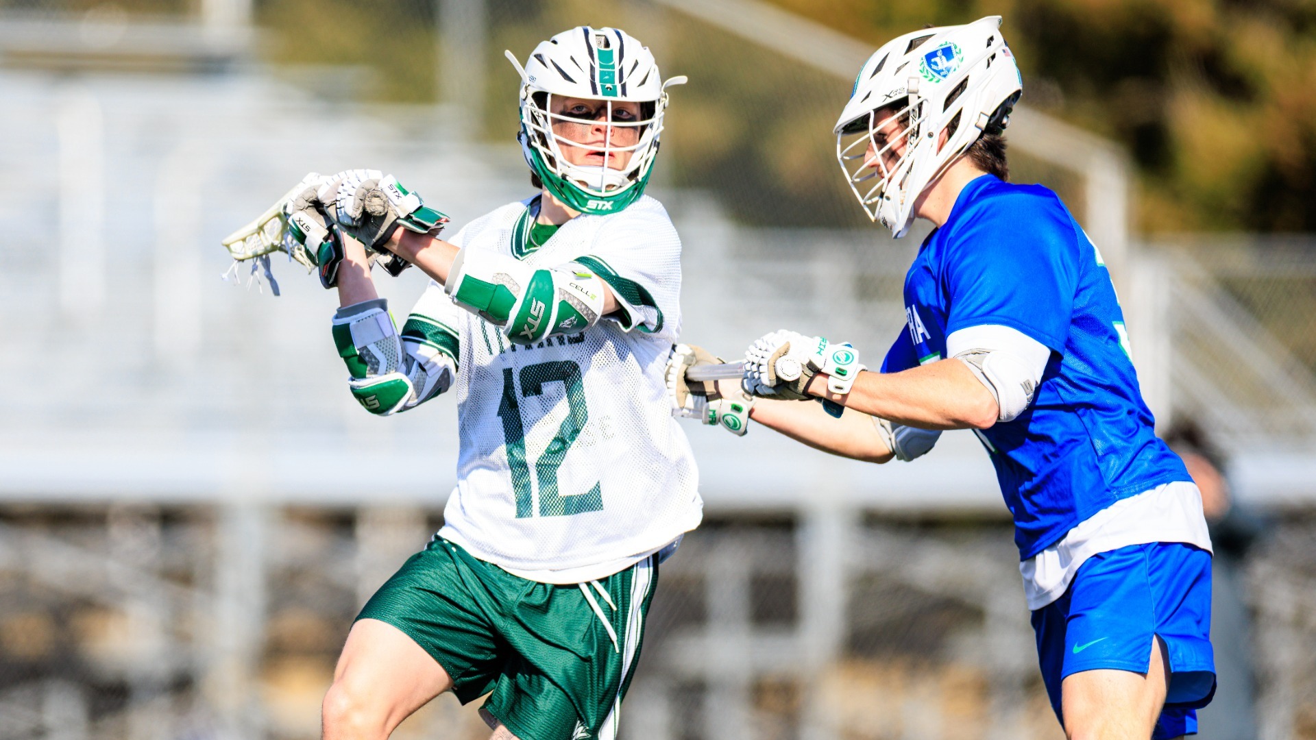 Charlie Burghardt about to pass the ball against Aurora Feb. 21, 2026