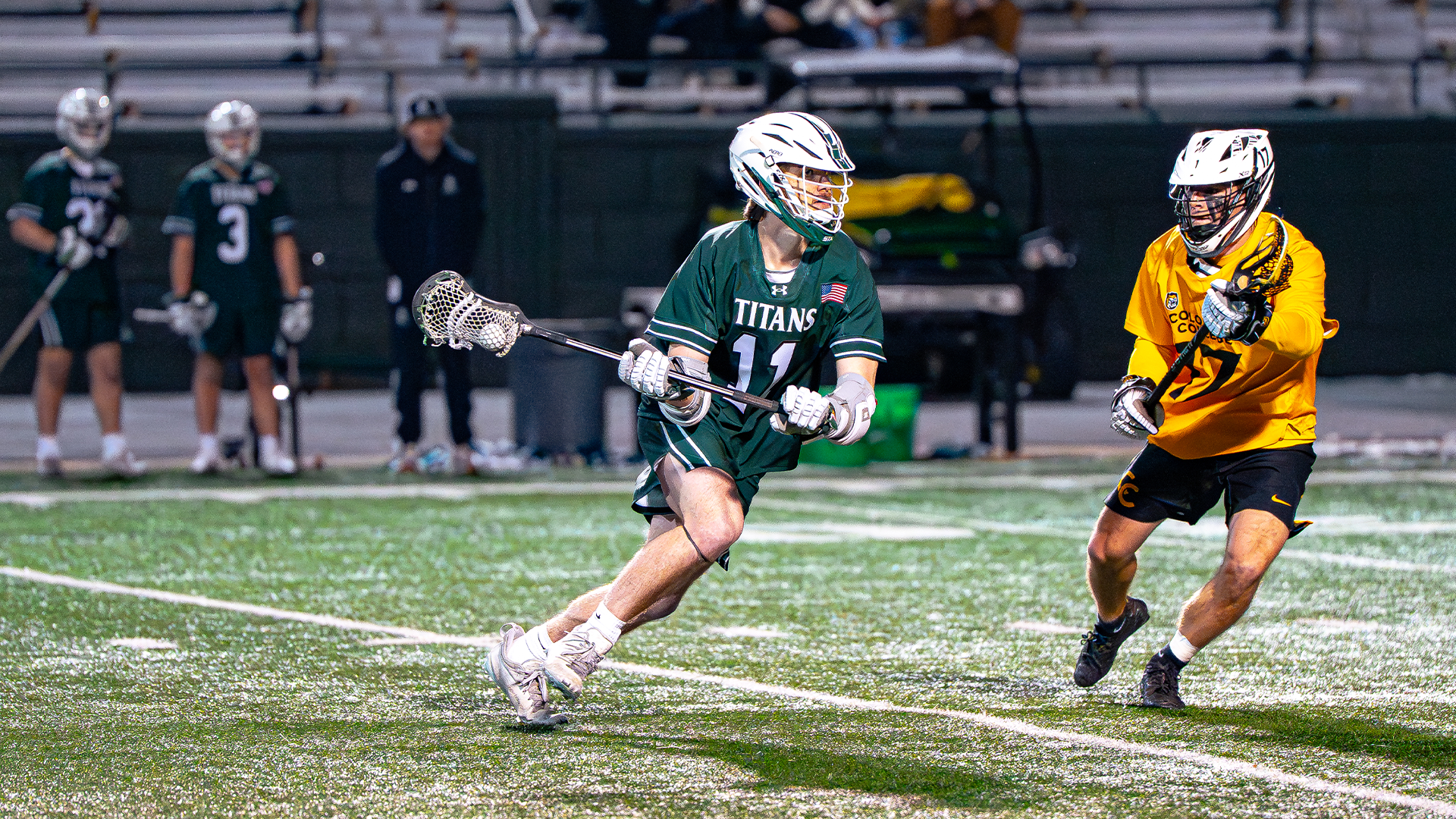 Cole Kennedy driving with the ball against Colorado College Feb. 13, 2026