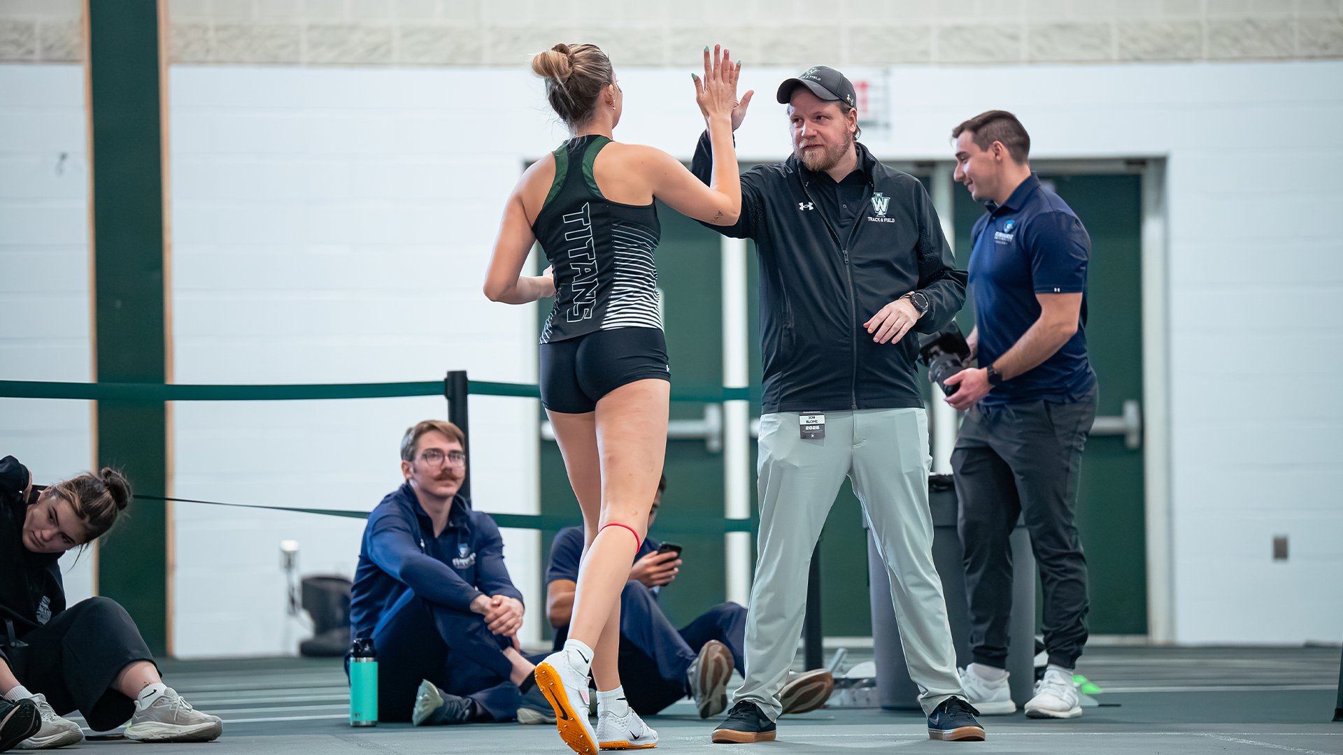 Madden and Coach Blome at CCIW Indoor Championships 2026