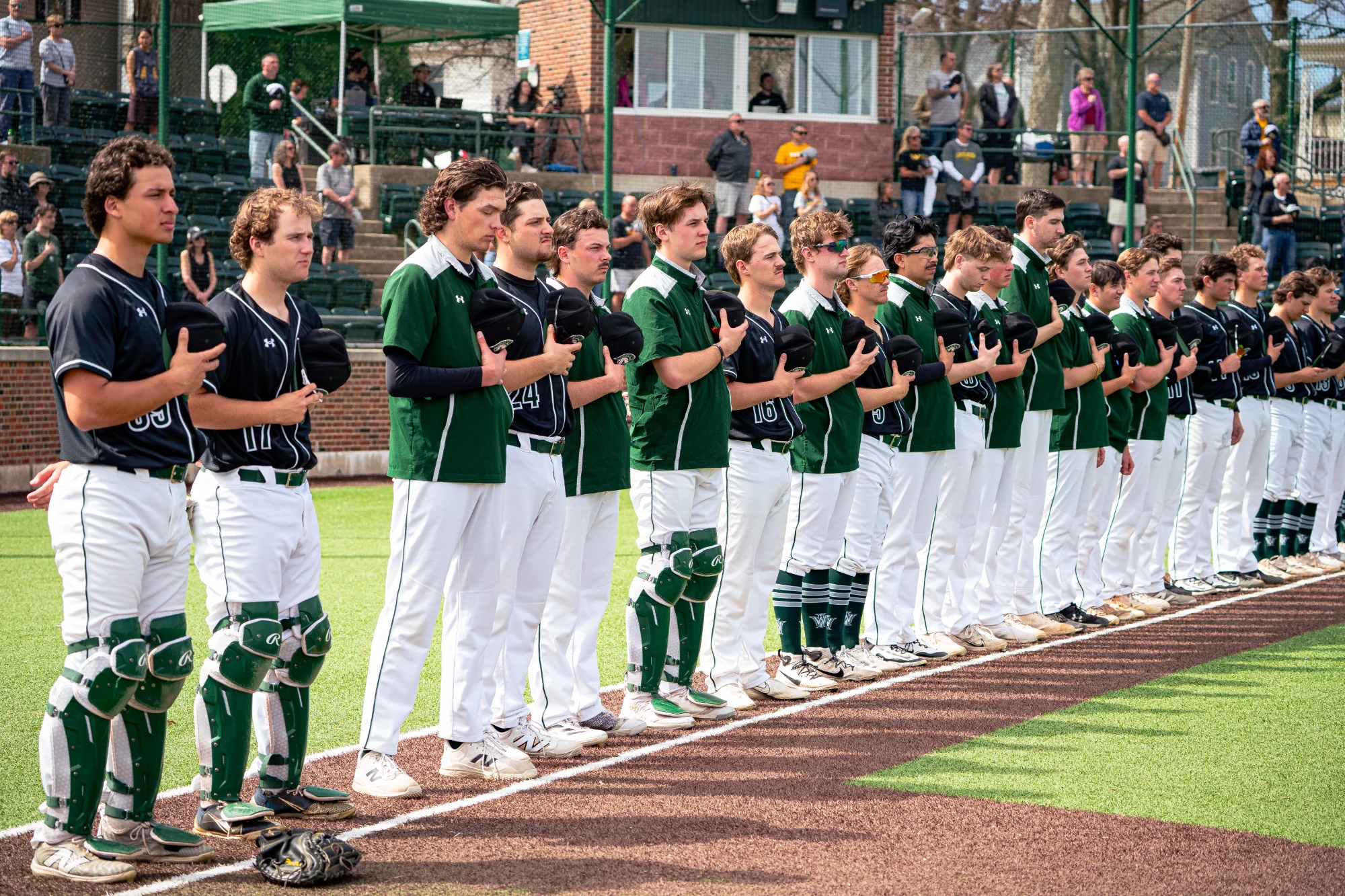 Baseball during the national anthem against UW-Oshkosh