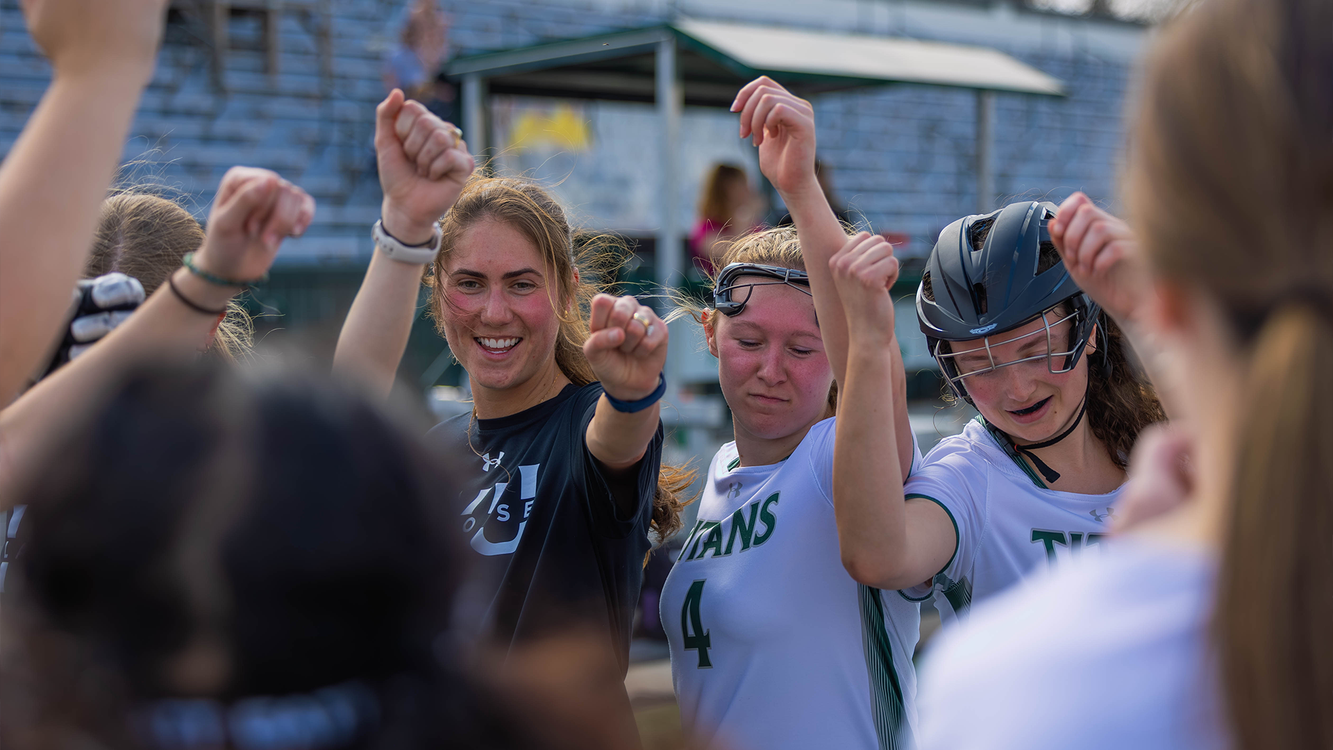 Women's lacrosse huddle against DePauw March 10, 2026