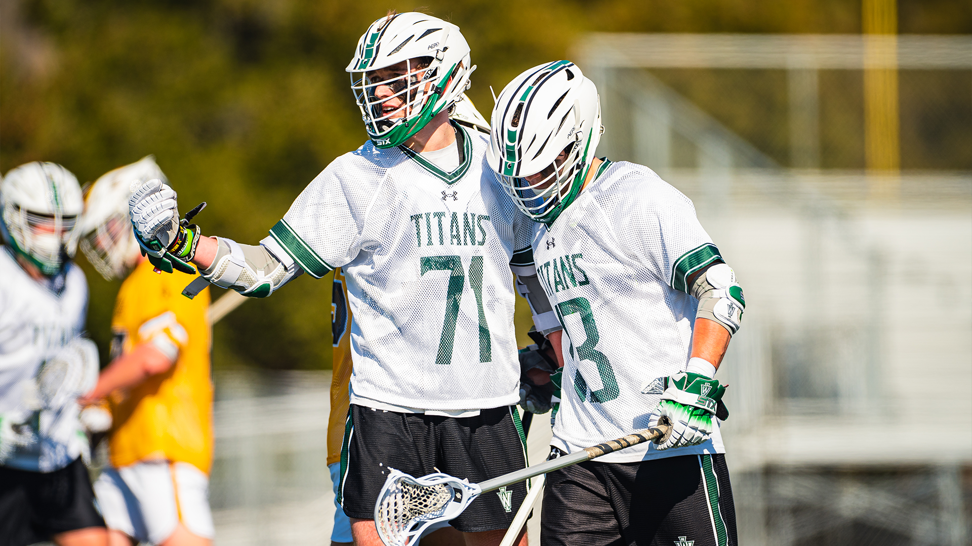 Timothy McHugh and Noah Dretzka celebrating a goal
