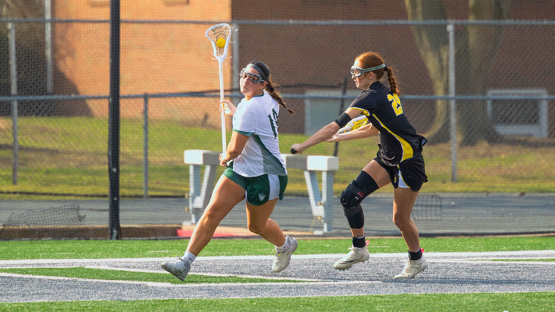 Lillie Keeton driving with the ball against DePauw March 10, 2026
