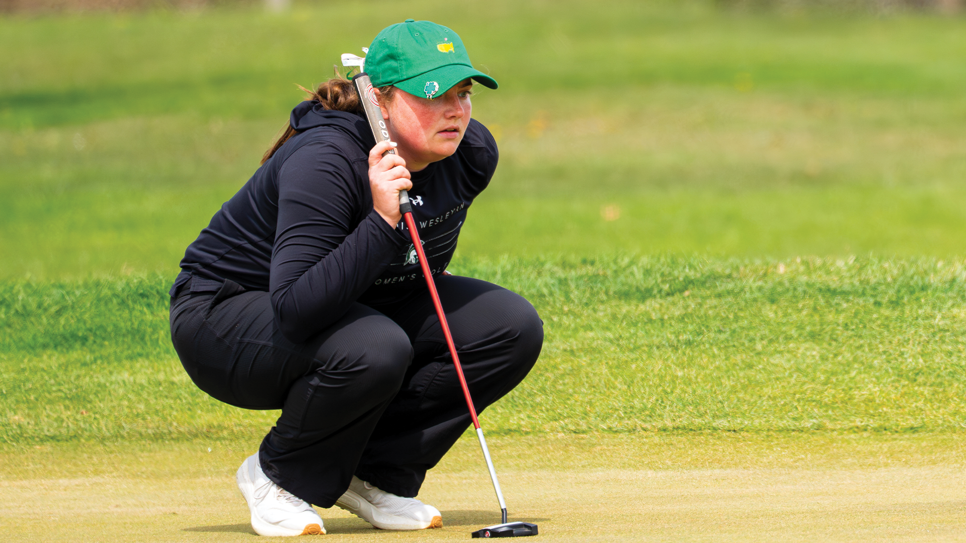 Grace Fagan putting at Kathy Niepagen Spring Invite 4-11-2026