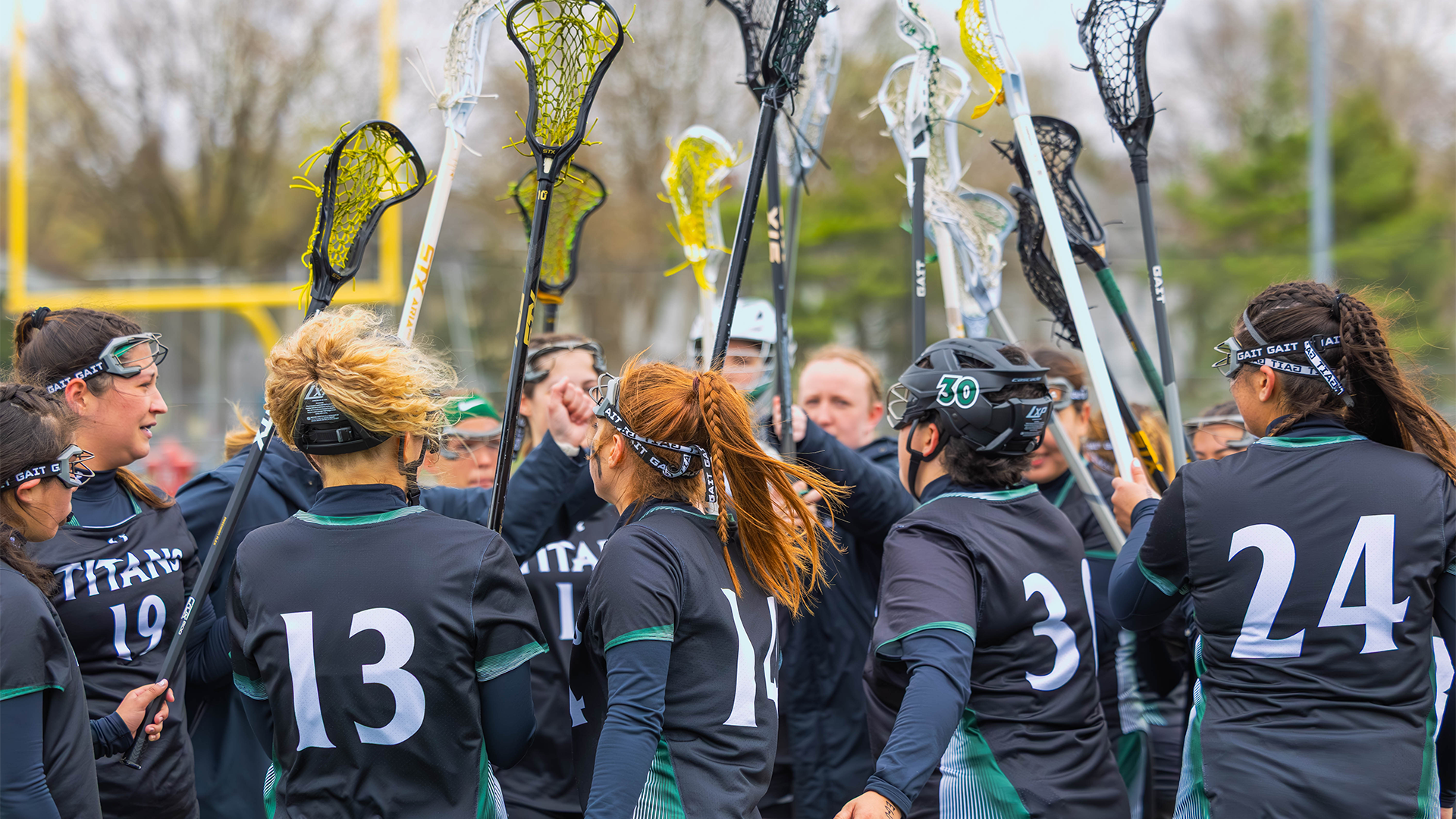 Women's lacrosse team huddle against North Central April 4, 2026