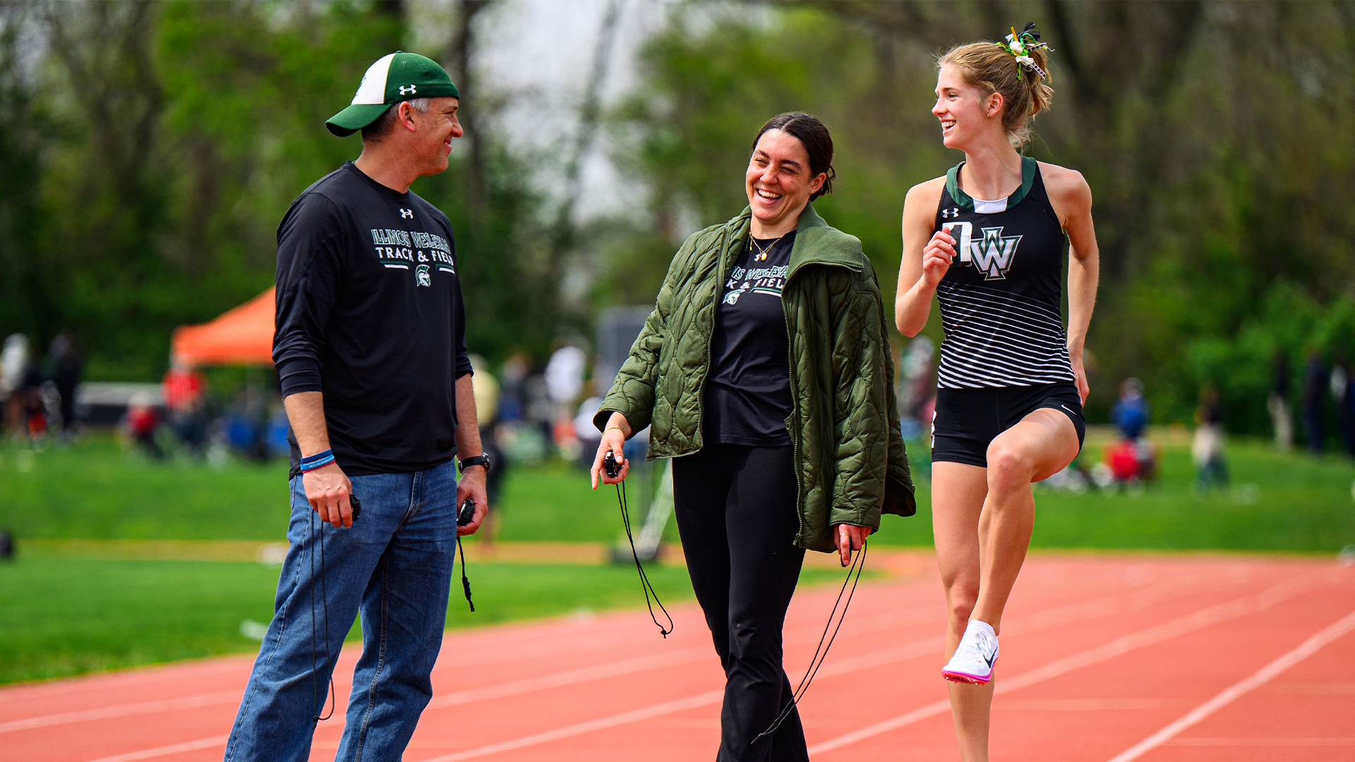 Coach Huffaker, Lambert, and Adriana Crabtree Preparing for CCIW Outdoor Championship