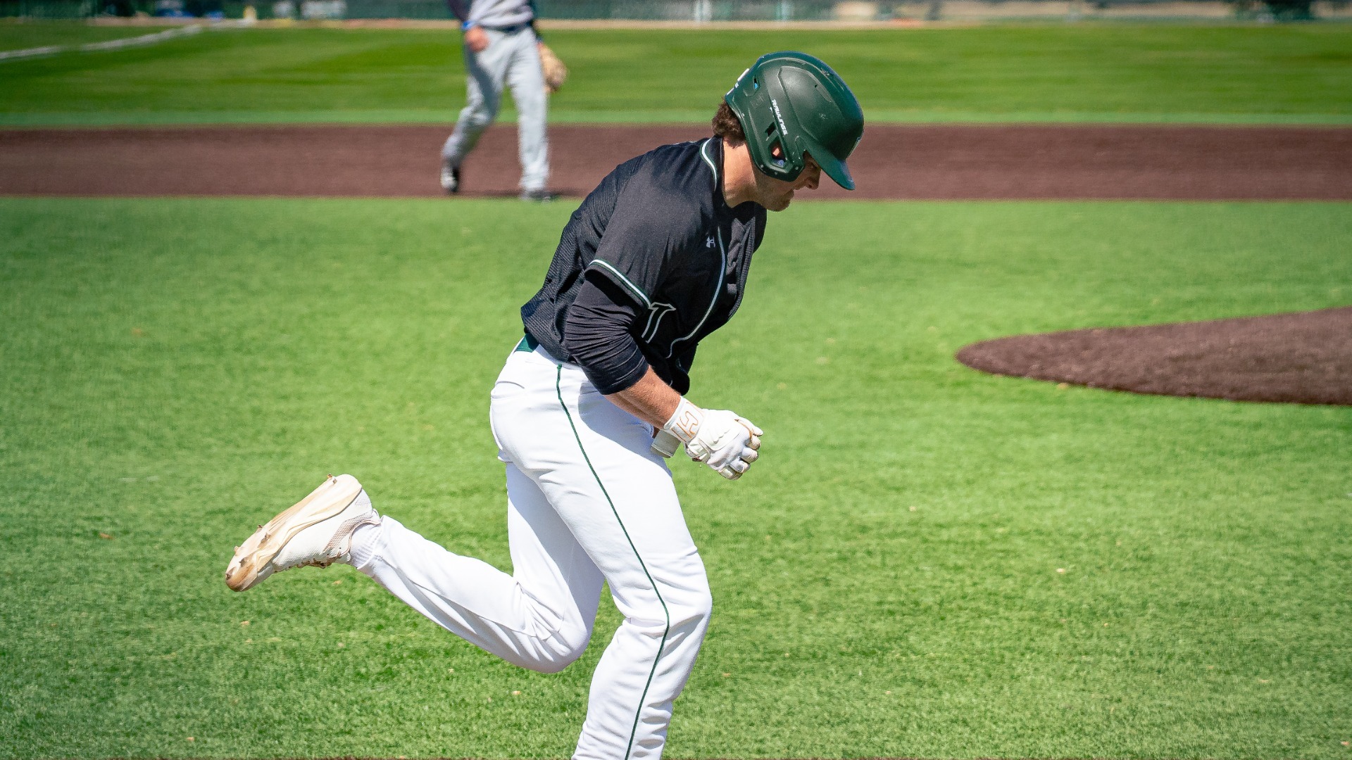 AJ Weller running the bases vs Millikin 3-28-26